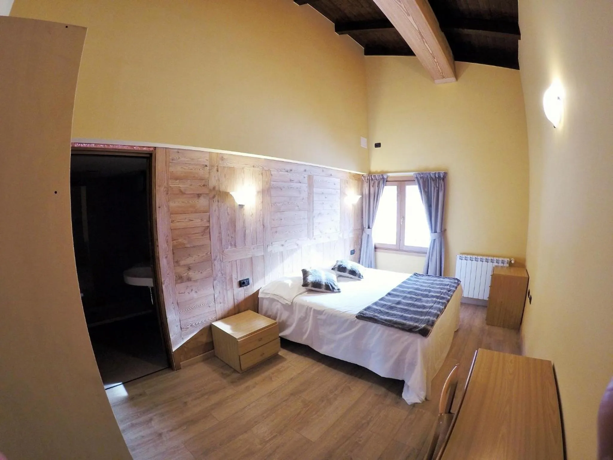 Photo of the whole room, Bed in Chalet Alpina Hotel & Apartments
