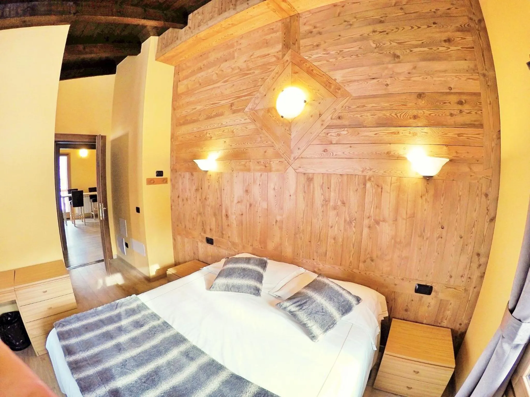 Bed in Chalet Alpina Hotel & Apartments
