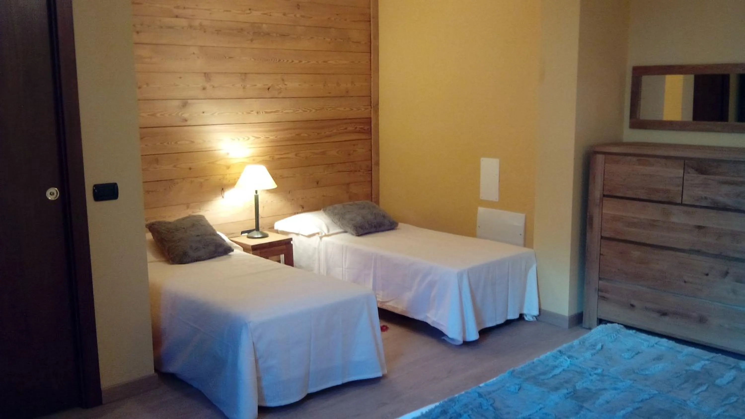 Bedroom, Bed in Chalet Alpina Hotel & Apartments