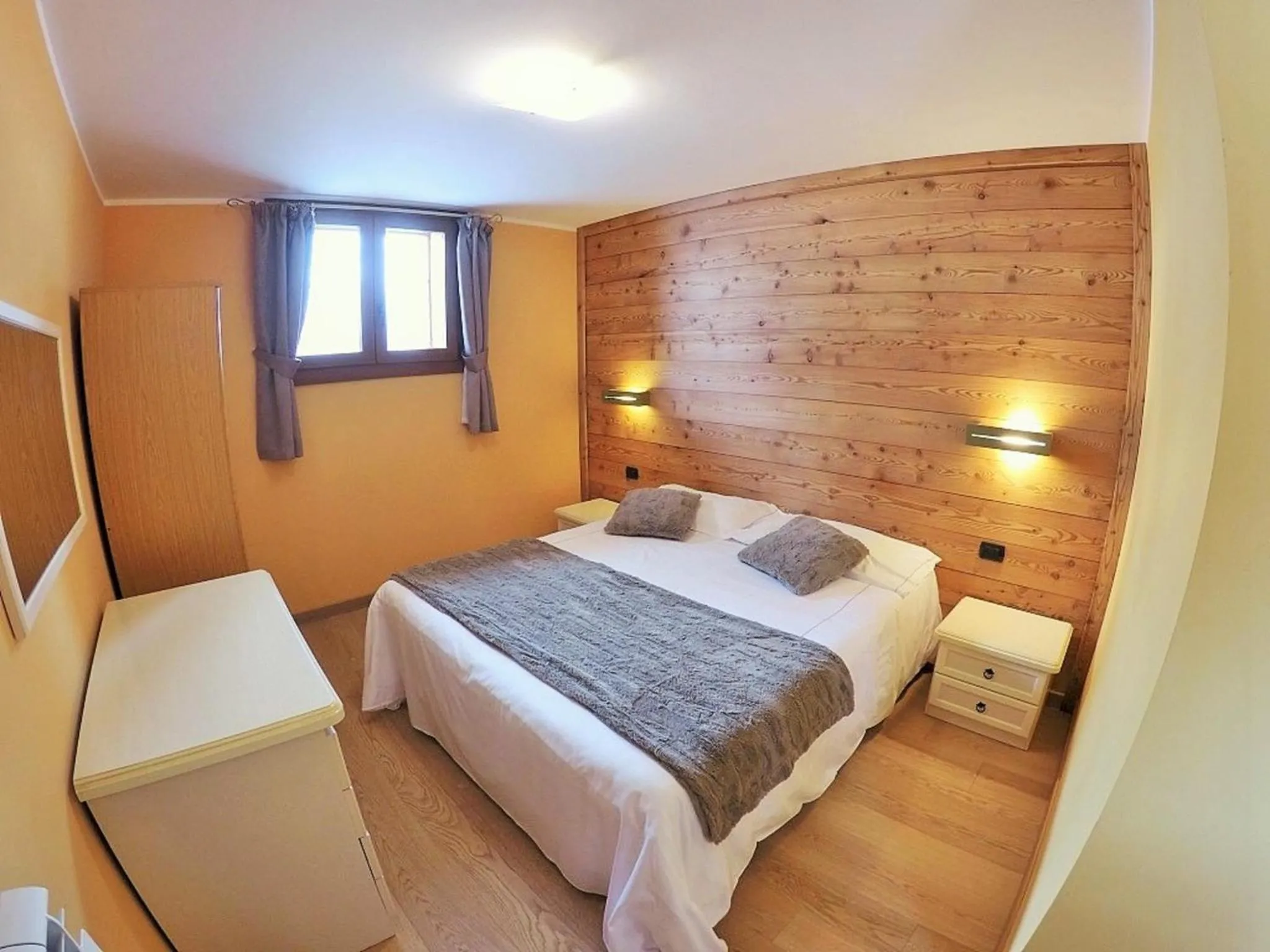 Bed in Chalet Alpina Hotel & Apartments