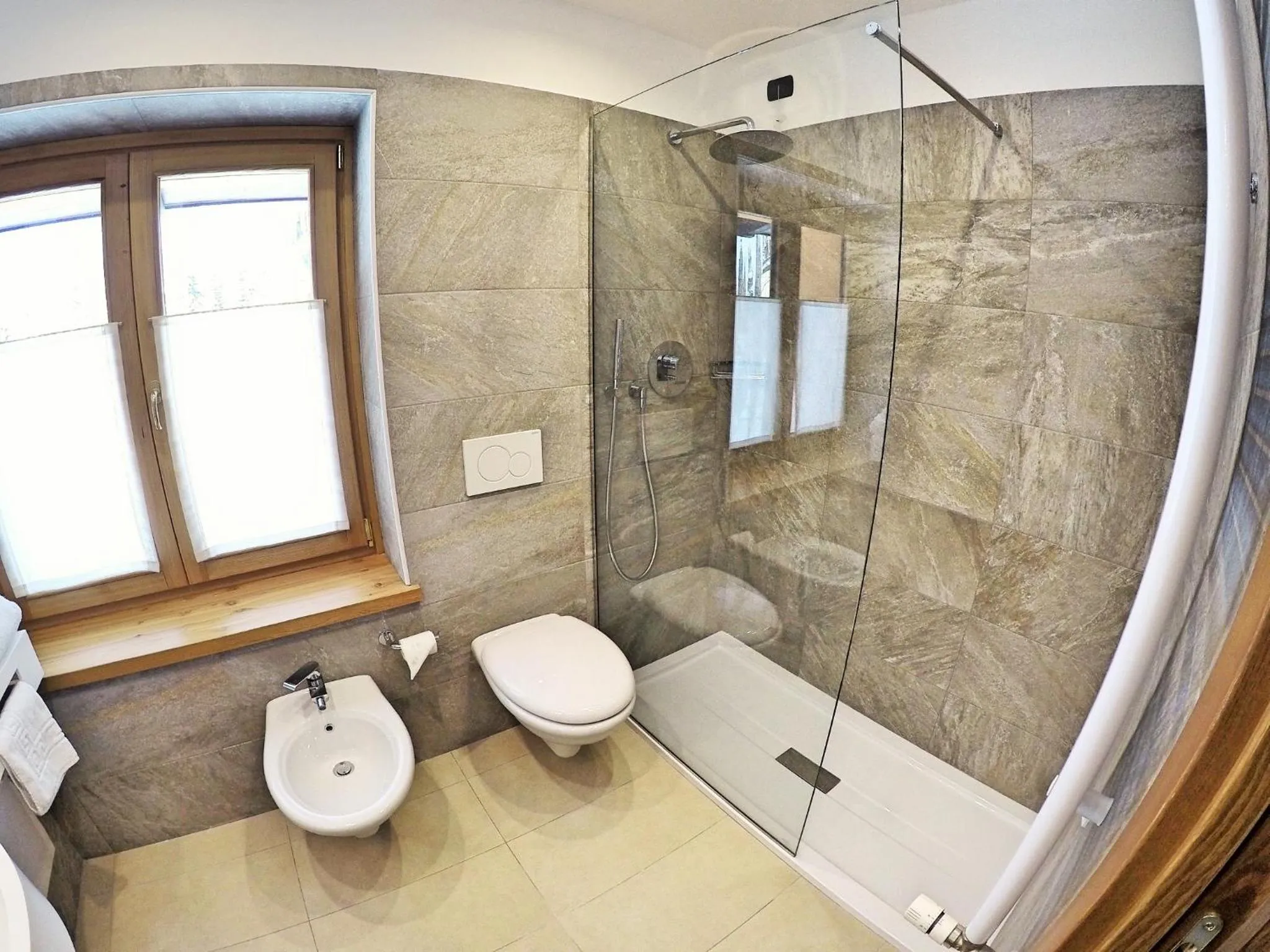 Bathroom in Chalet Alpina Hotel & Apartments