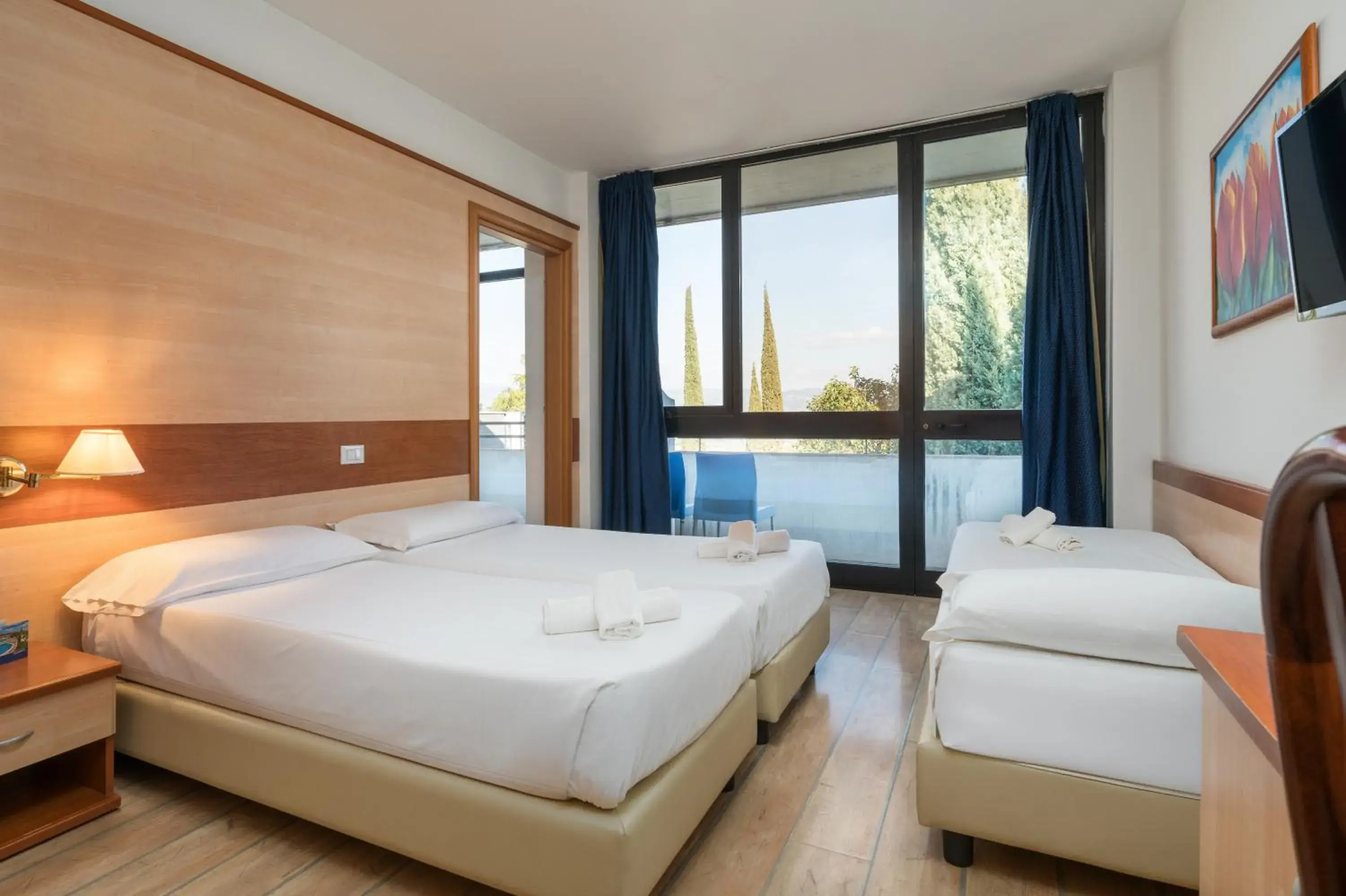 Triple Room in Hotel Centro Turistico Gardesano Triple Room in Hotel Centro Turistico Gardesano
