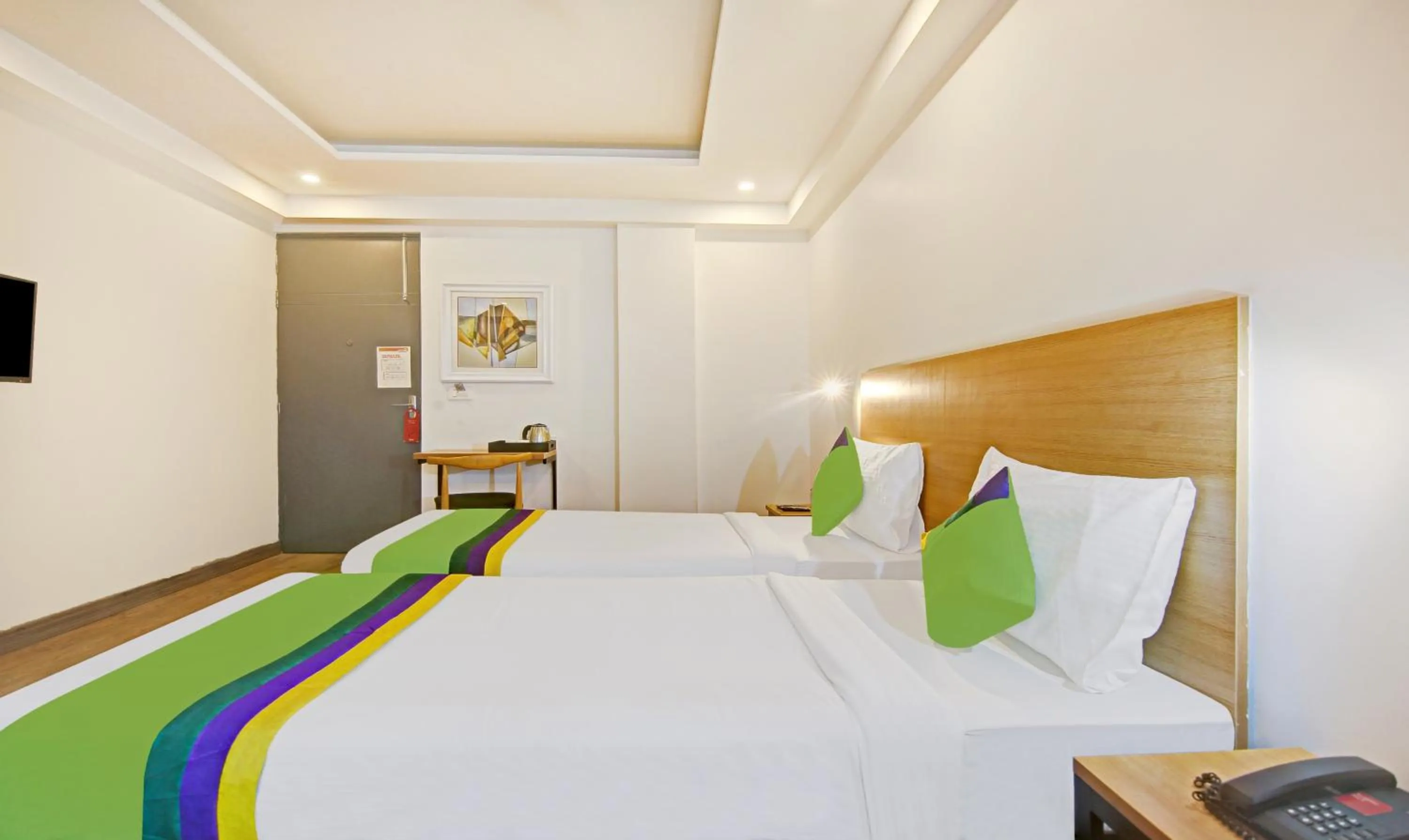 Bed in Treebo Ahinsa Residency Sohna Road