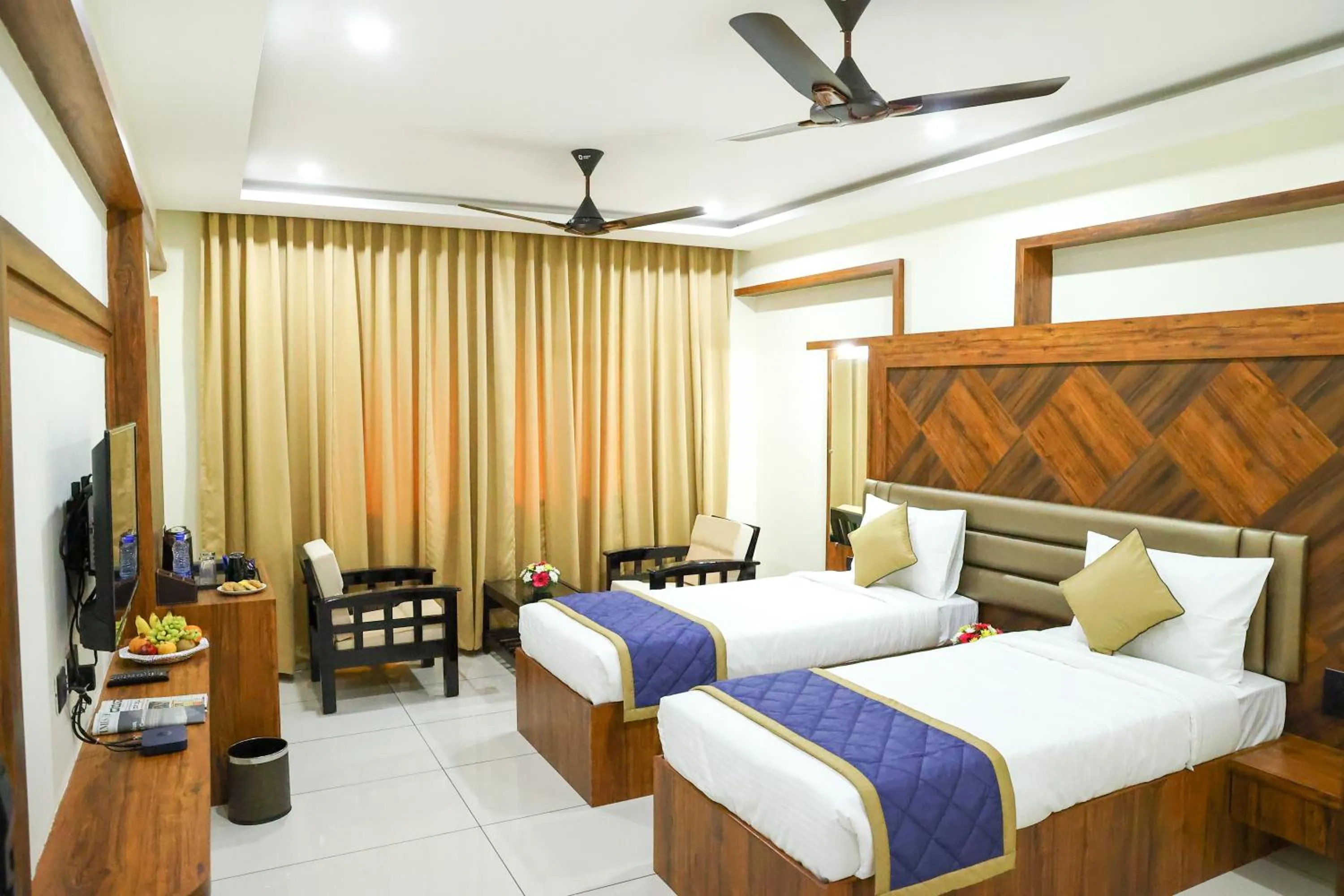 Photo of the whole room, Bed in Hotel Udupi Inn, Udupi