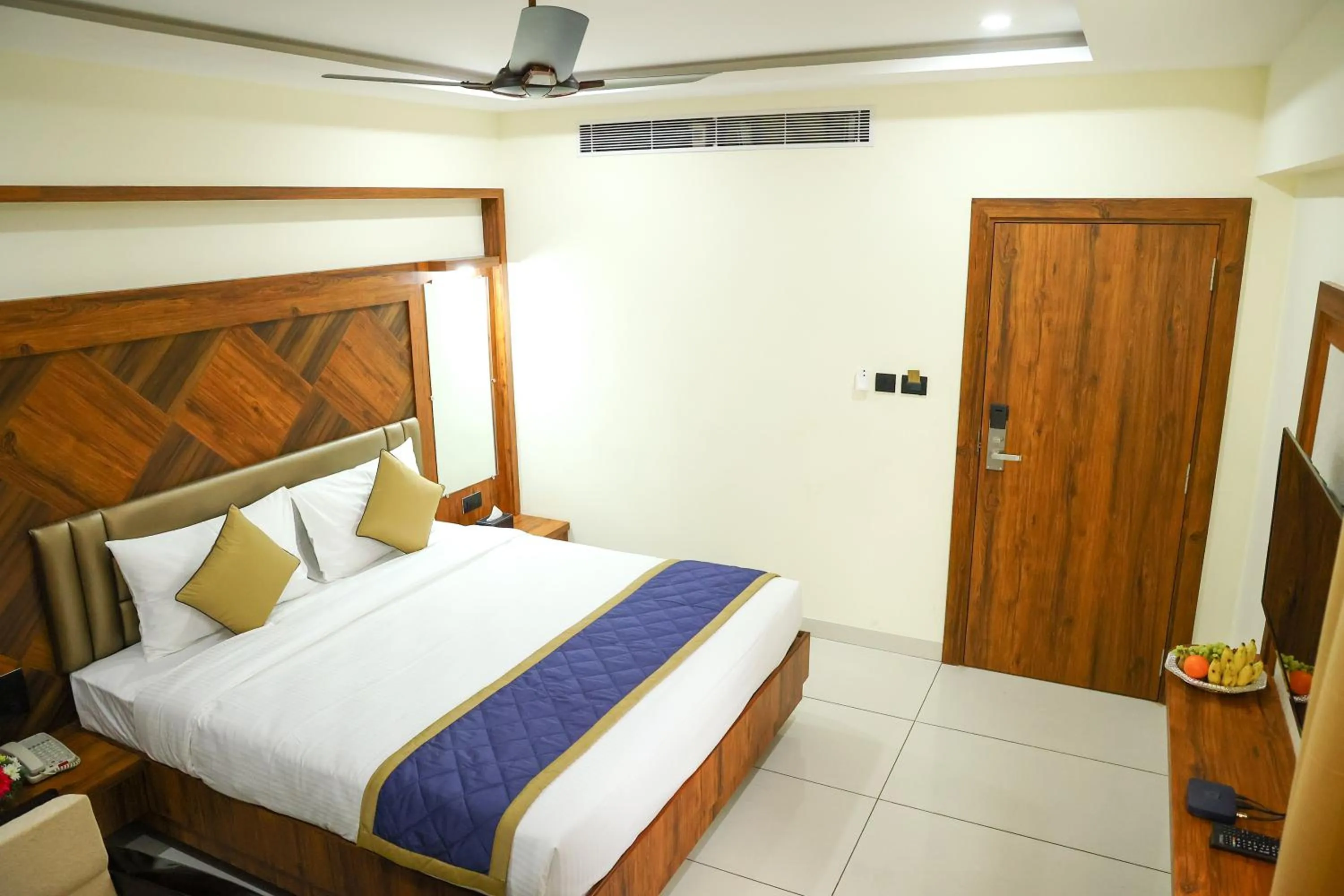 Bed in Hotel Udupi Inn, Udupi