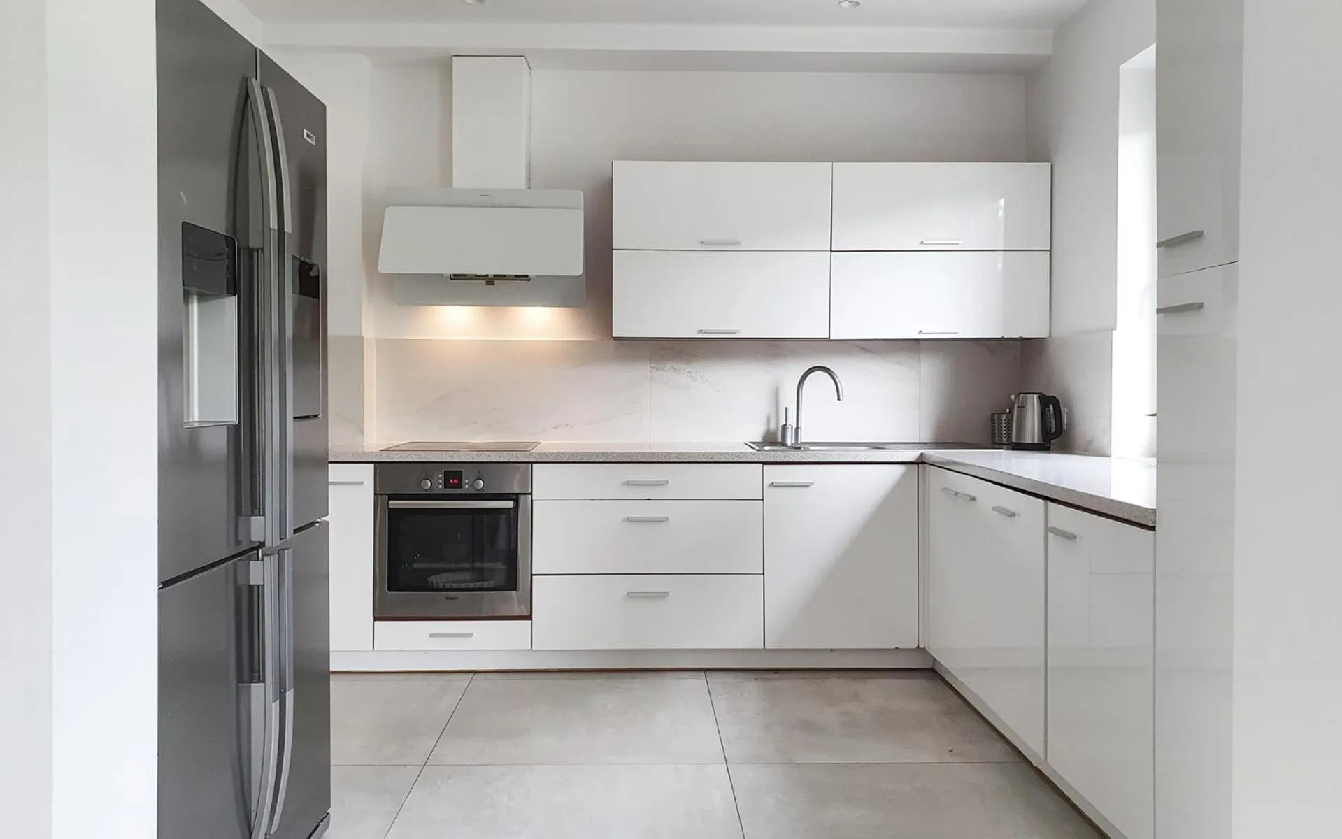 Kitchen or kitchenette in Holimo Hotel