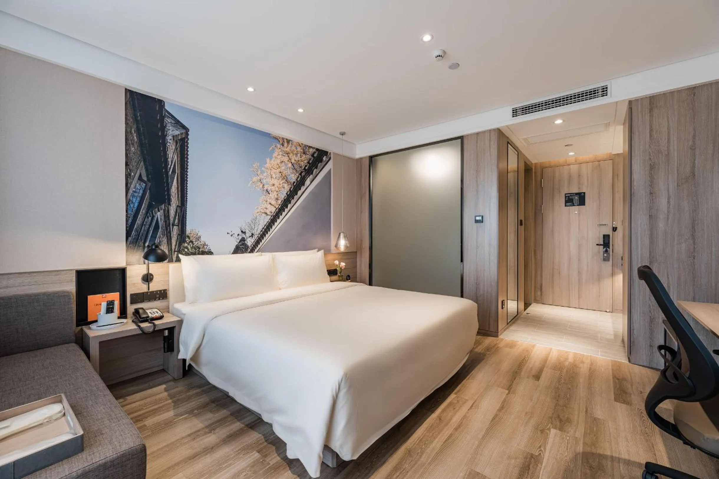 Bed in Atour Hotel Zhenjiang Xijindu Jinshan Temple