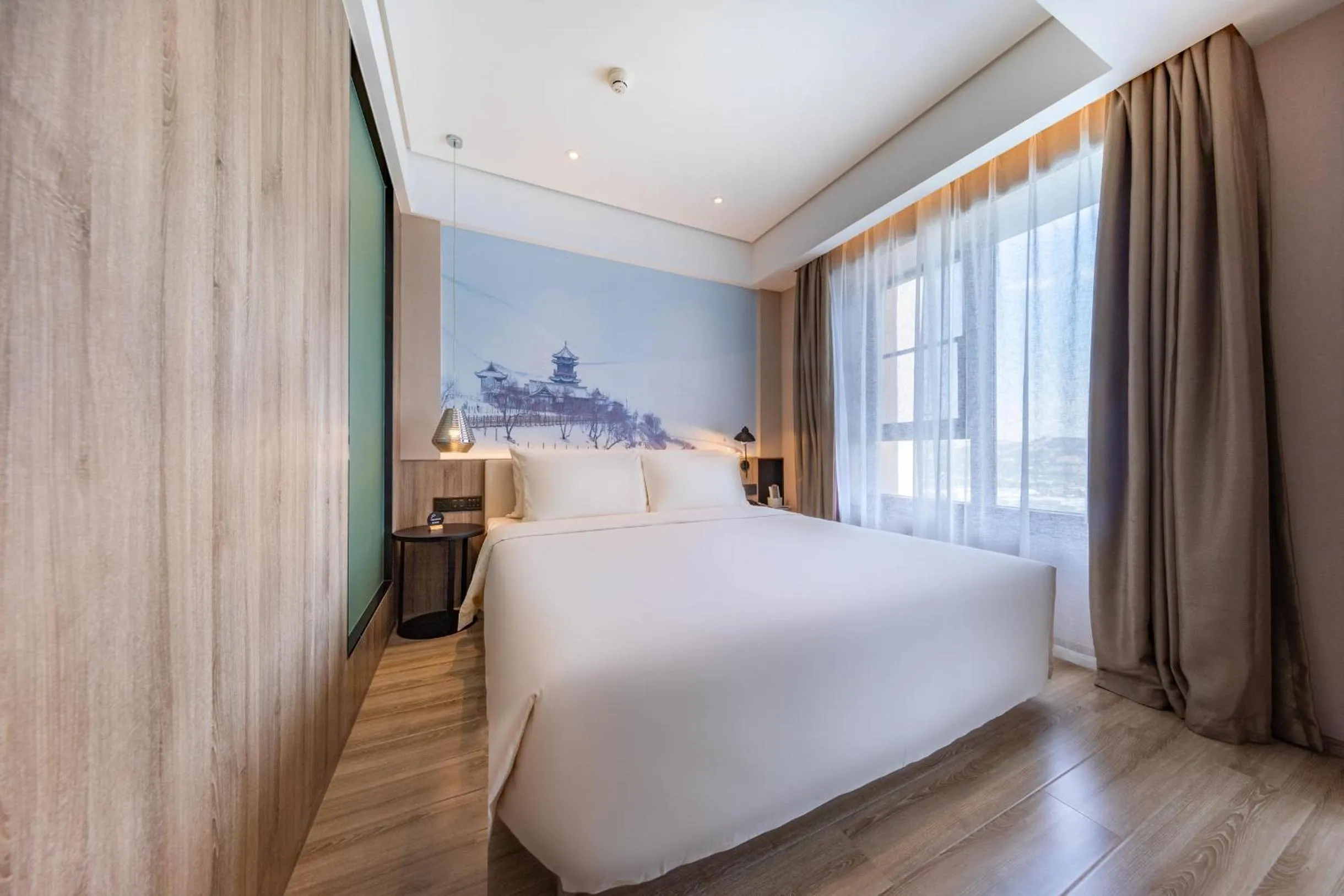 Bed in Atour Hotel Lanzhou Anning Zhonghai Plaza