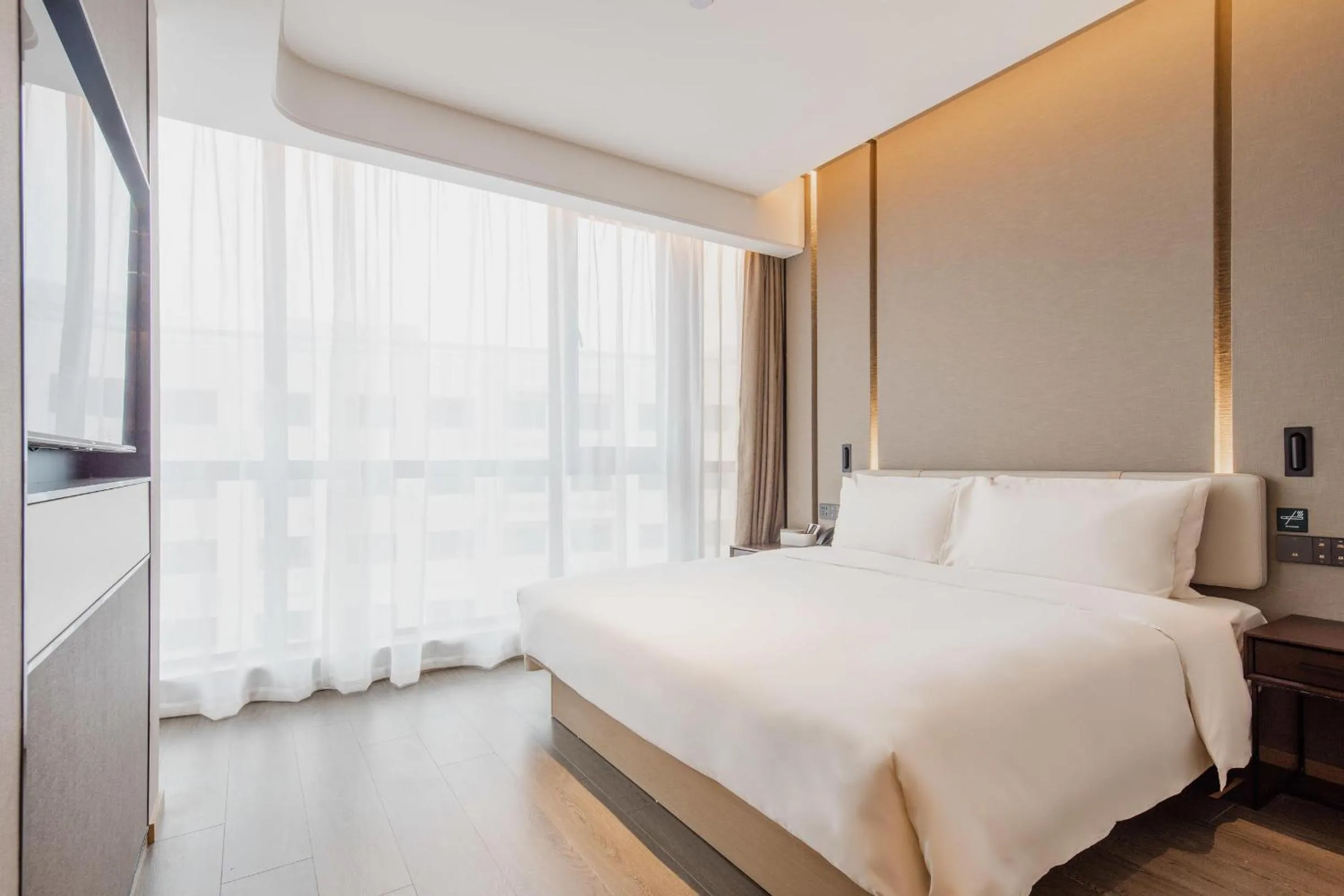 Bed in Atour Hotel Shanghai Pujiang