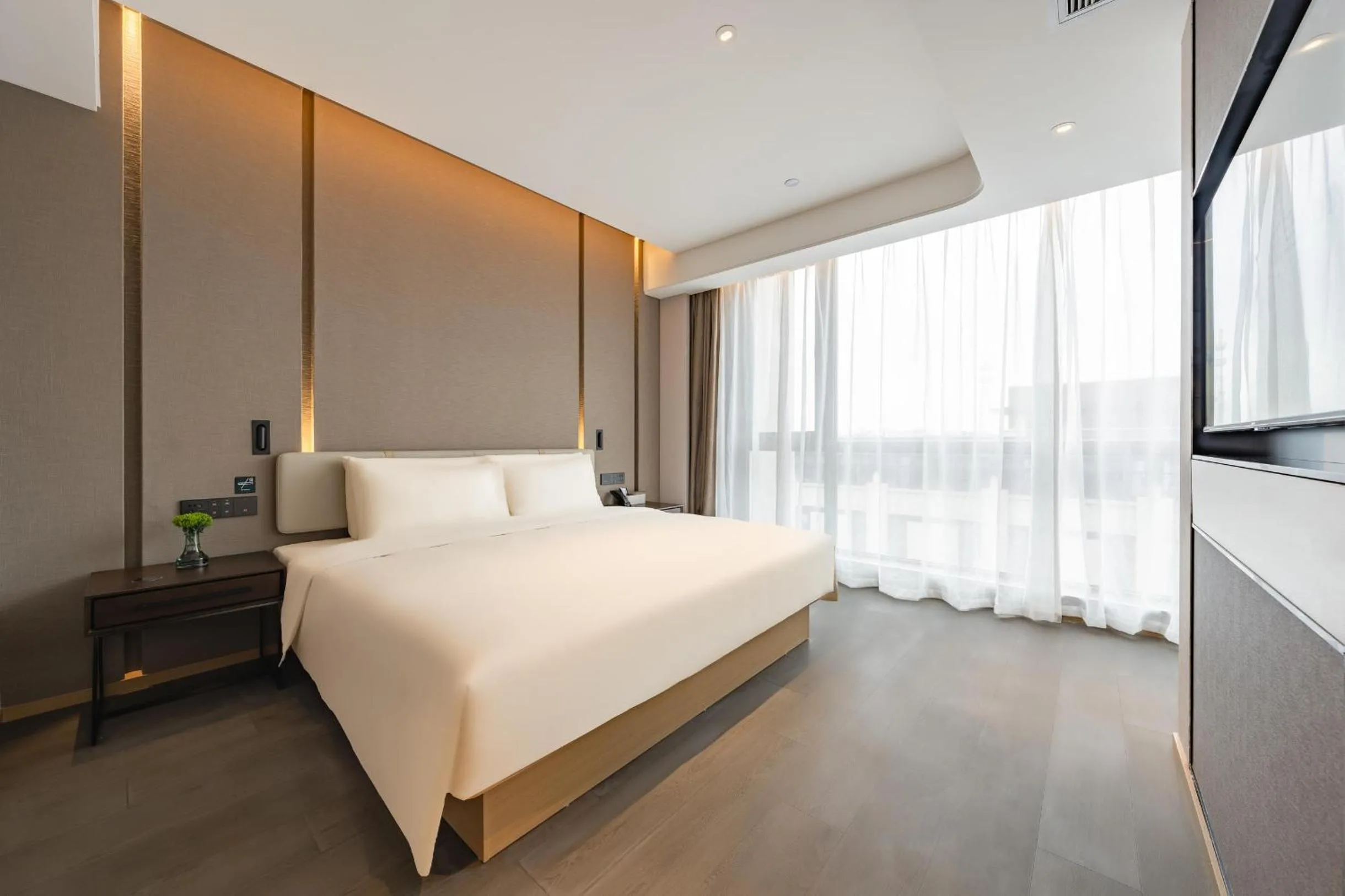 Bed in Atour Hotel Shanghai Pujiang