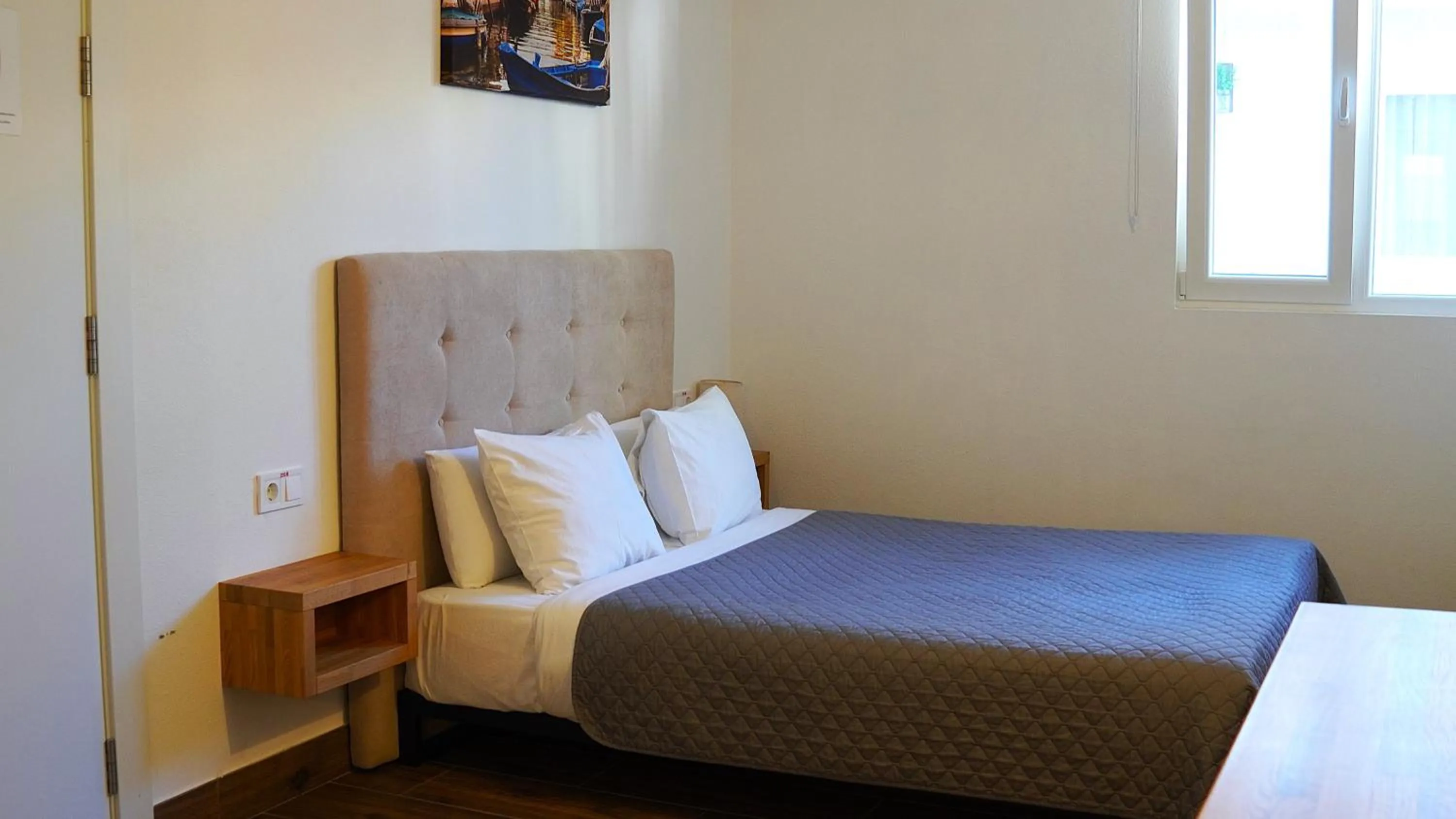 Bed in El Patio Hostal