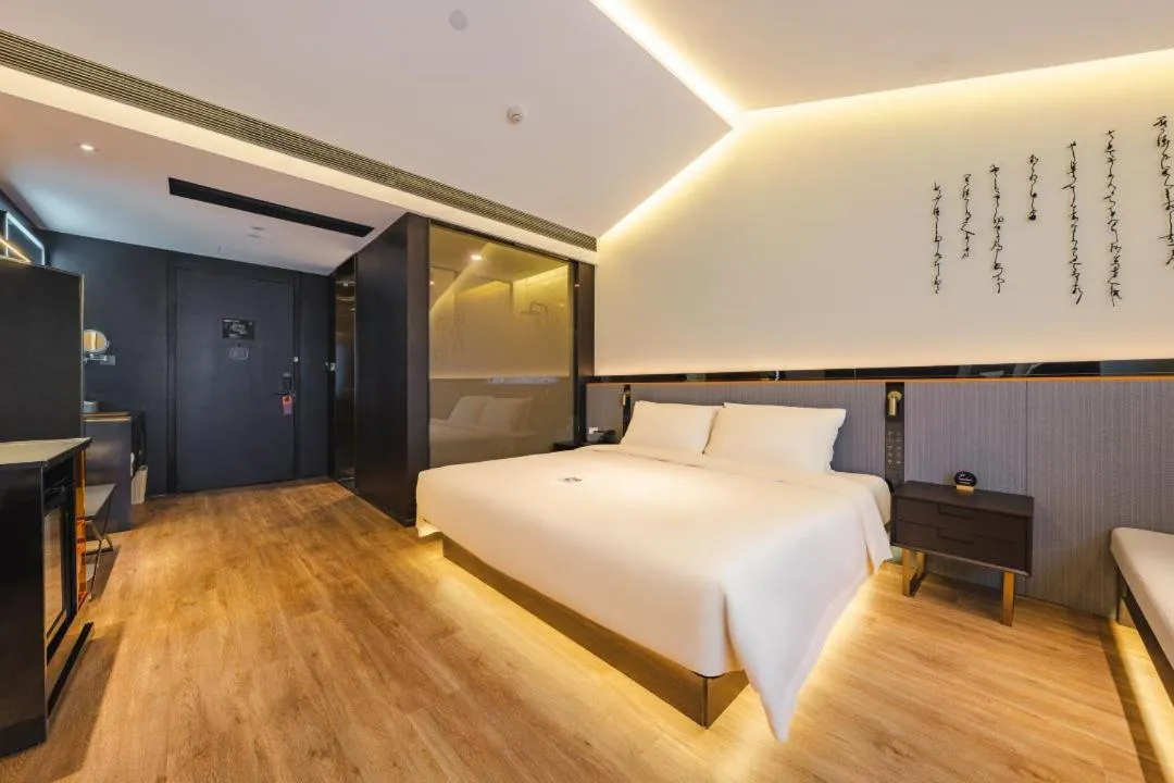 Bed in Atour S Hotel Wuxi Nanchang Street
