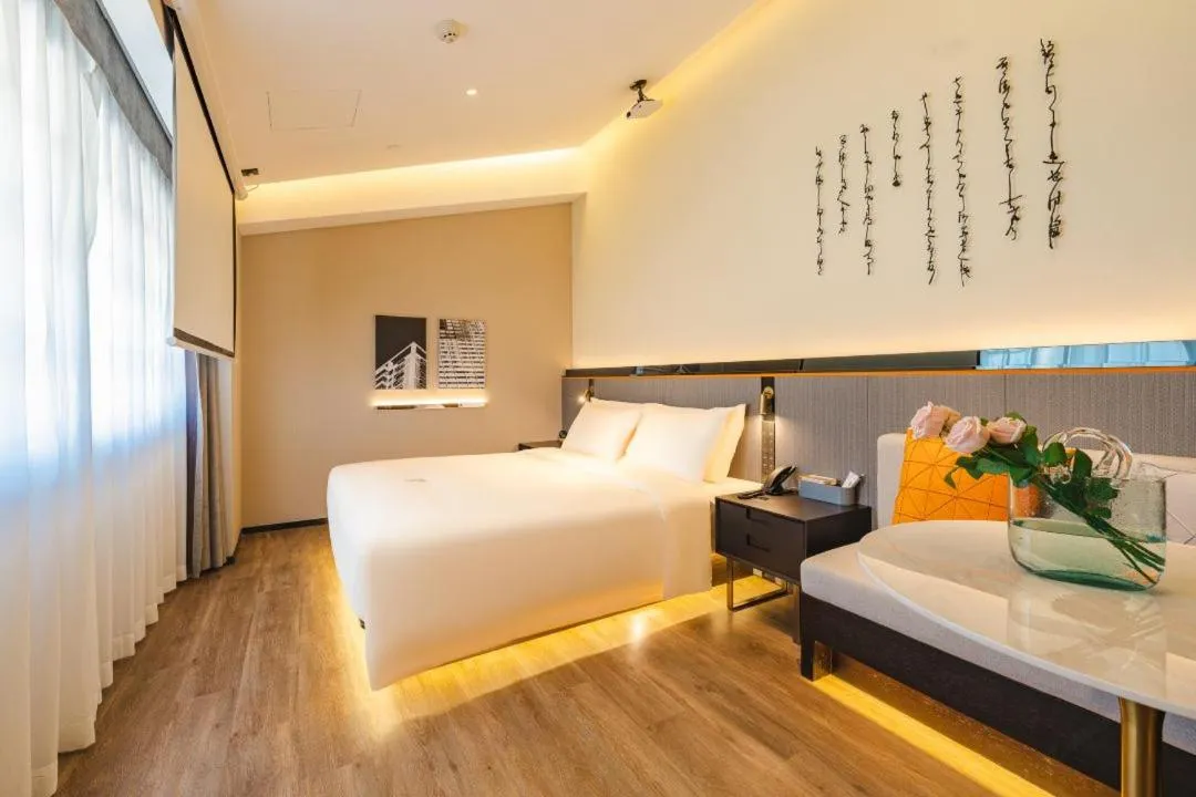 Bed in Atour S Hotel Wuxi Nanchang Street