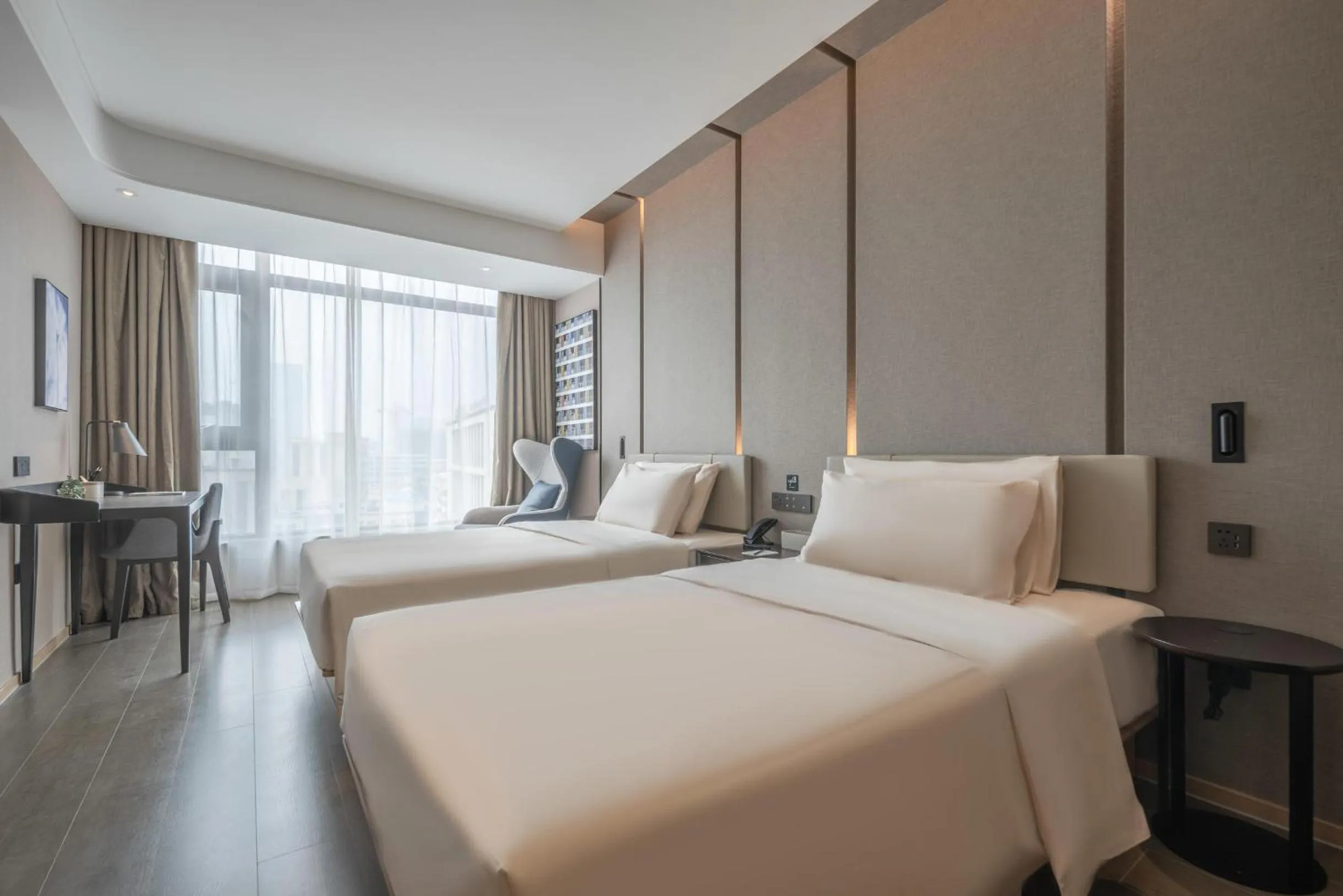 Bed in Atour Hotel Taizhou Maoye World