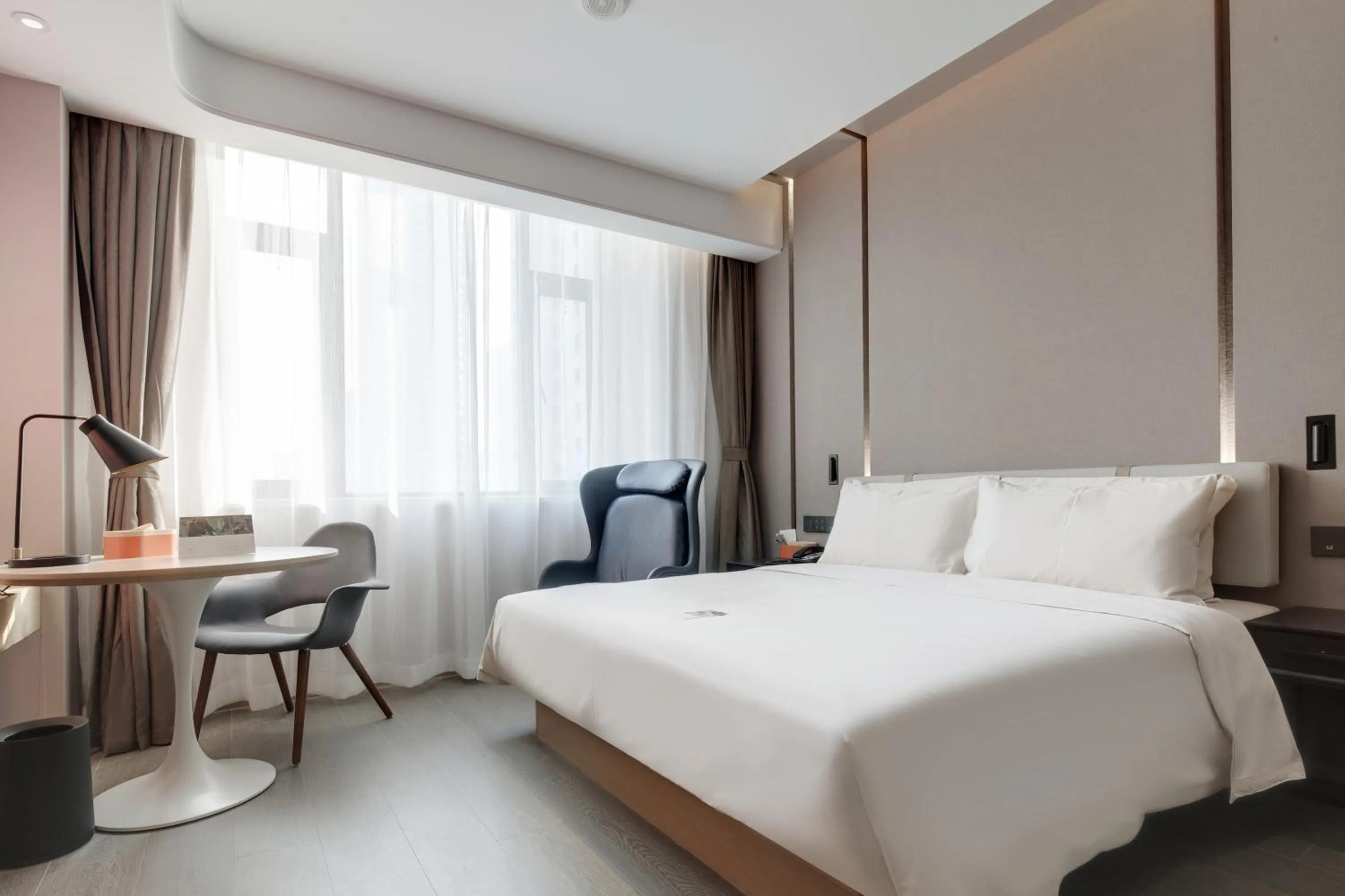 Photo of the whole room, Bed in Atour Hotel Jinan High-Speed East Railway Station