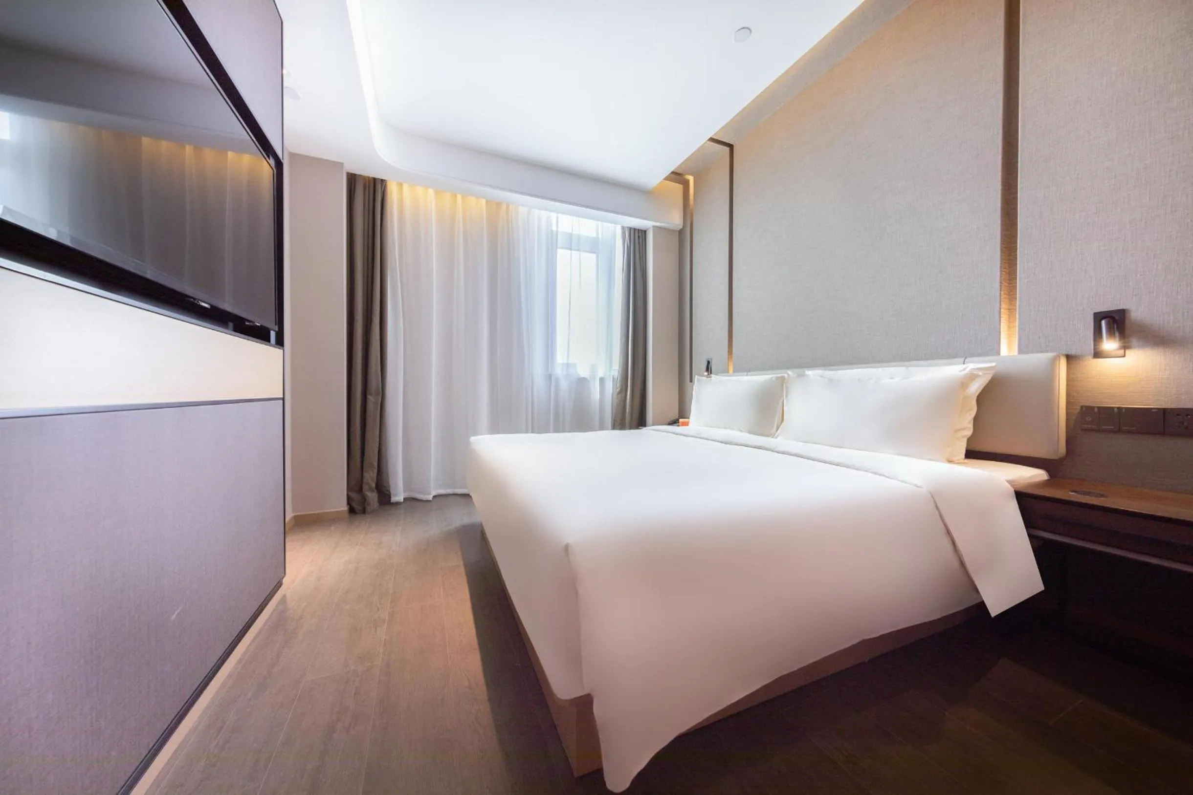 Bed in Atour Hotel Qingdao CBD Hangzhou Road