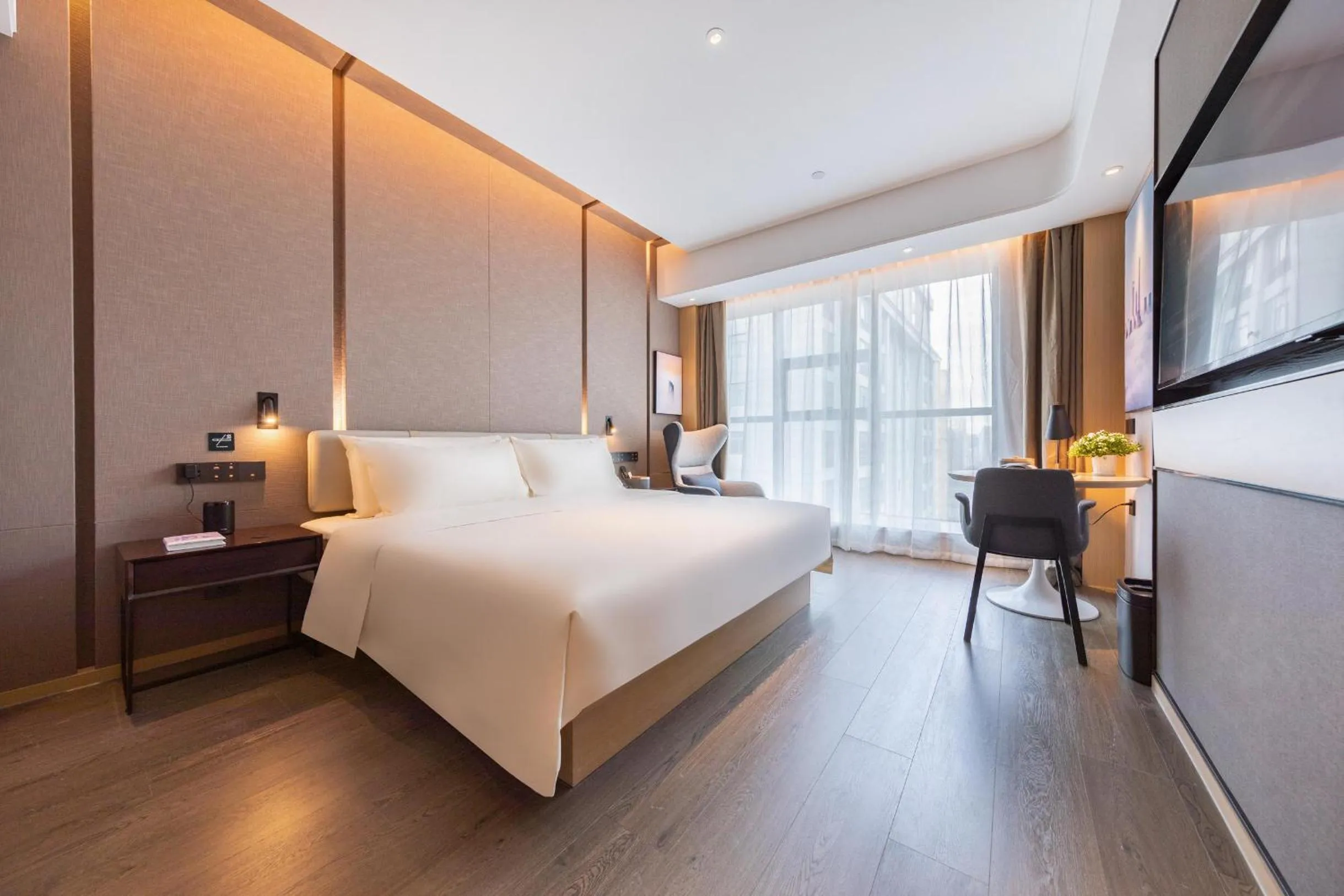 Bed in Atour Hotel Wuhan International Expo Center