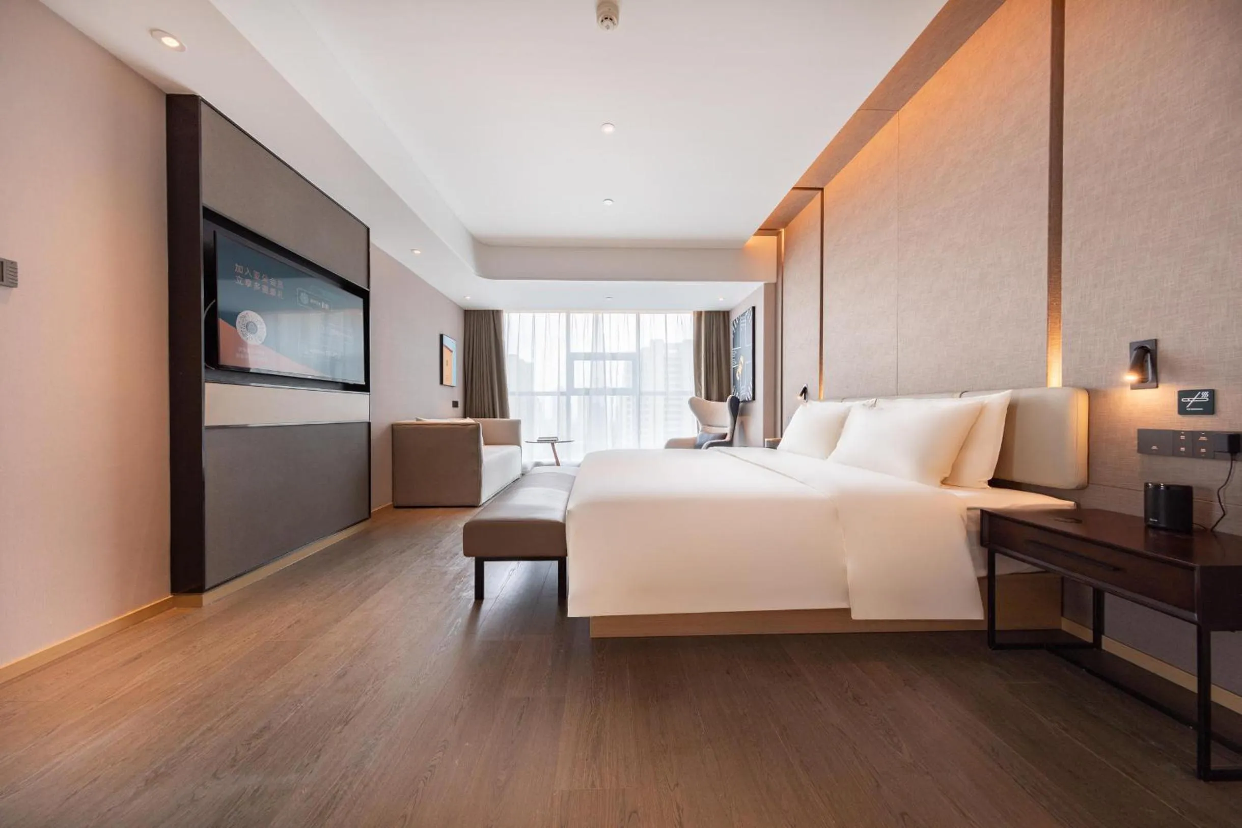 Bed in Atour Hotel Wuhan International Expo Center