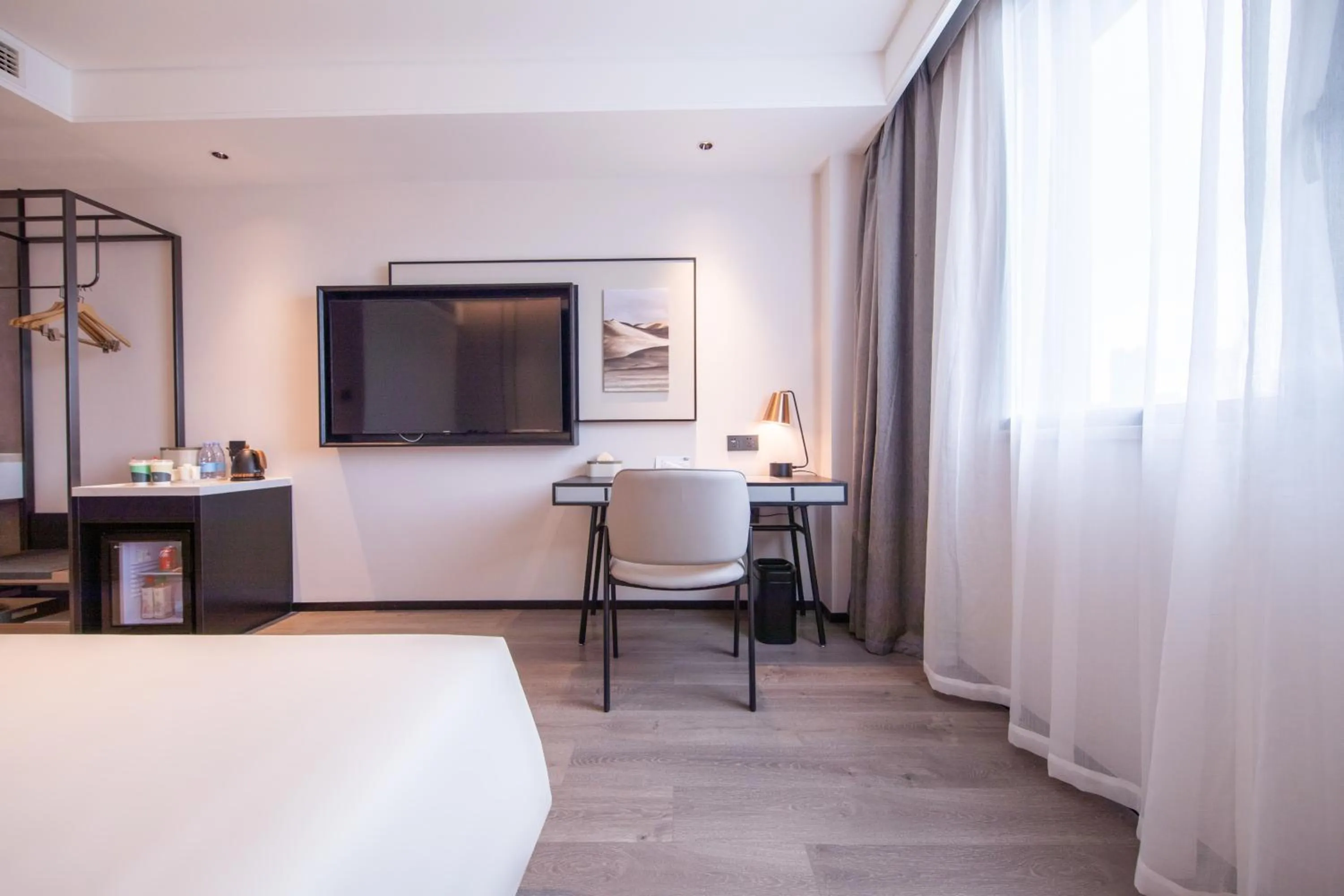 Bed in Atour Hotel Wuhan Optics Valley Square Yangjia Bay