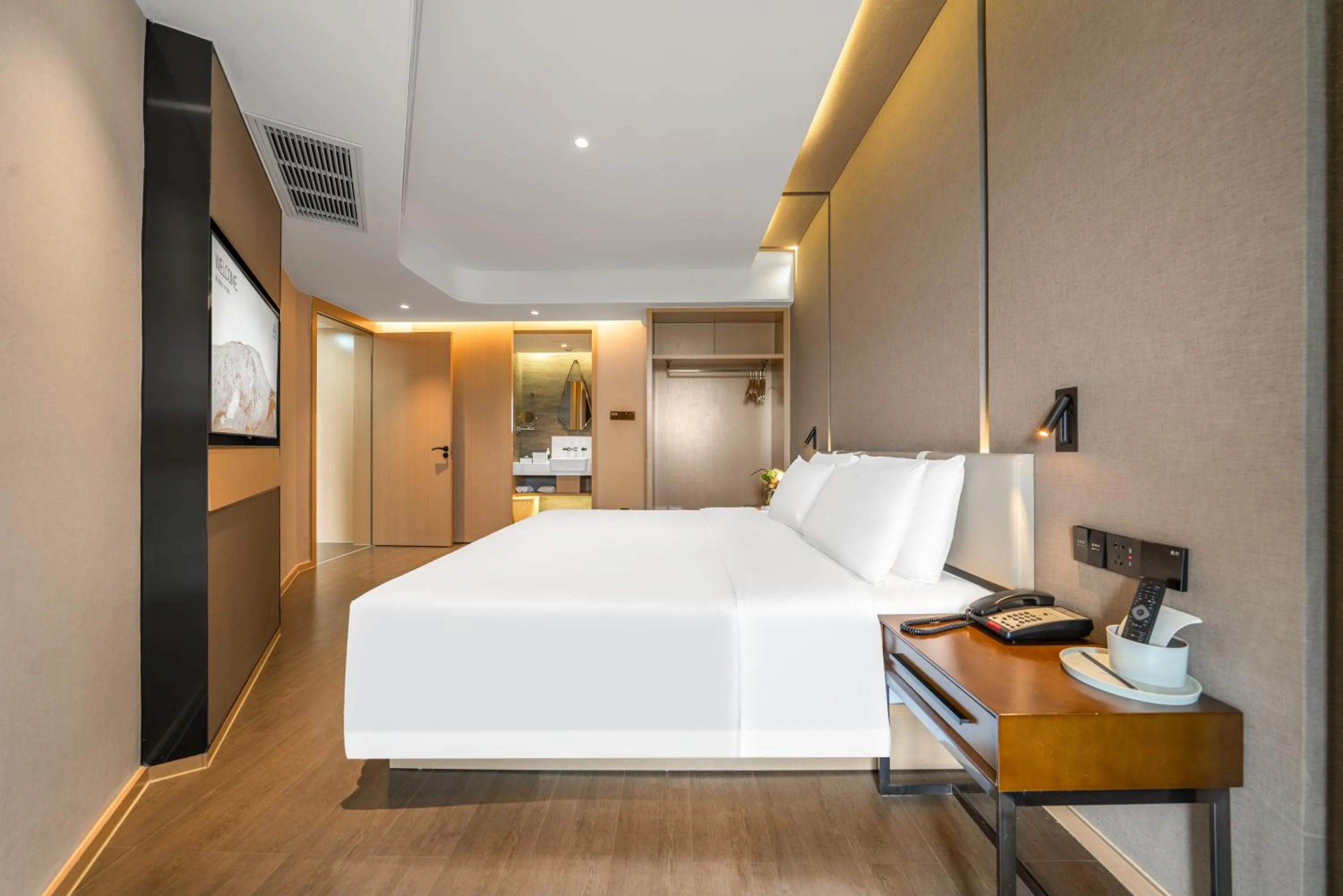 Bed in Atour Hotel Chongqing Yongchuan High-Speed Xinglong Lake