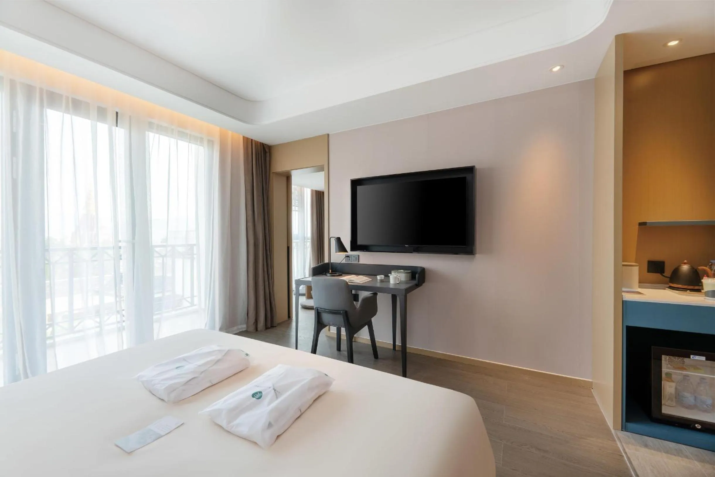 Bed in Atour Hotel Xishuangbanna Jinghong Gaozhuang Starlight Night Market