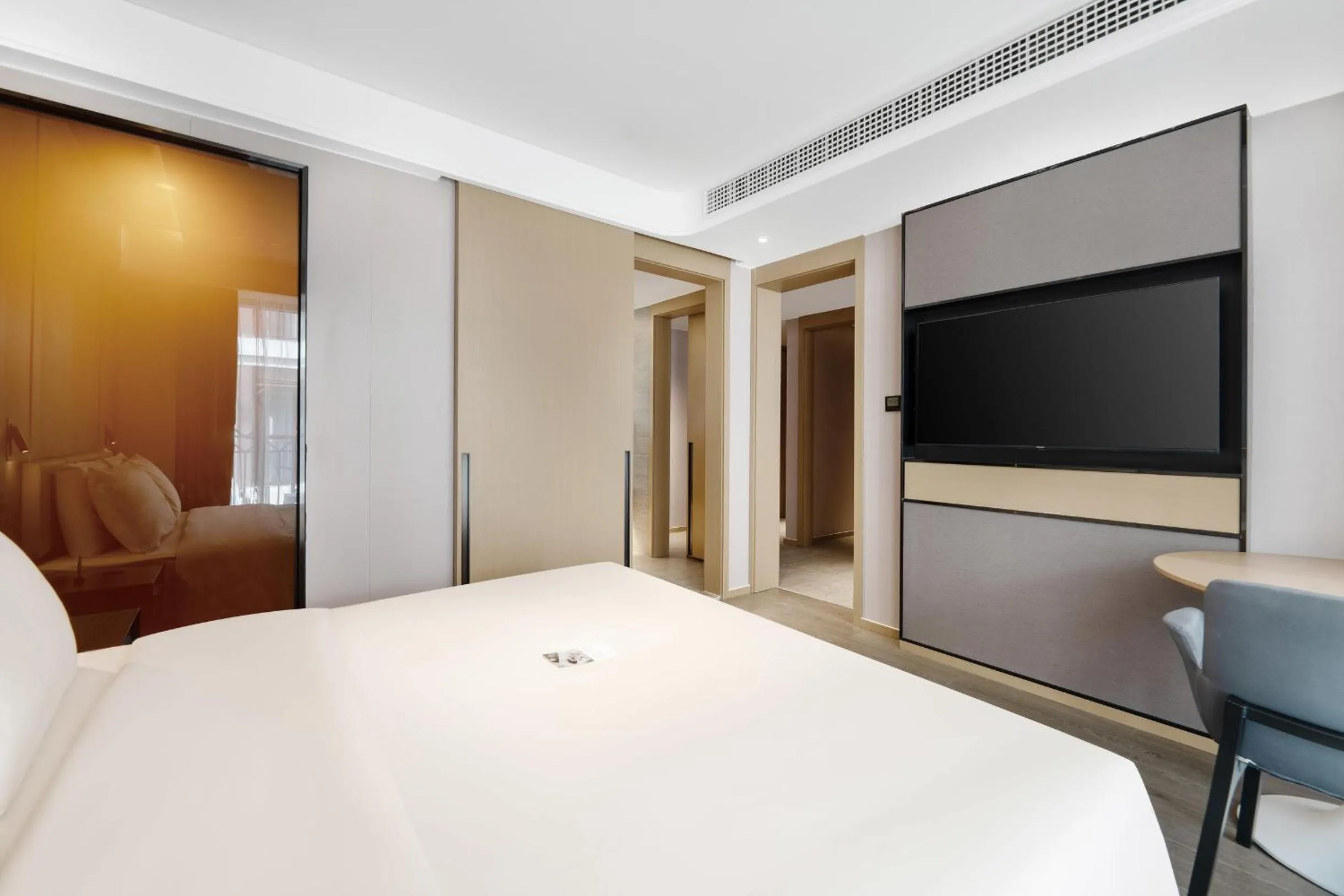 Bed in Atour Hotel Xishuangbanna Jinghong Gaozhuang Starlight Night Market