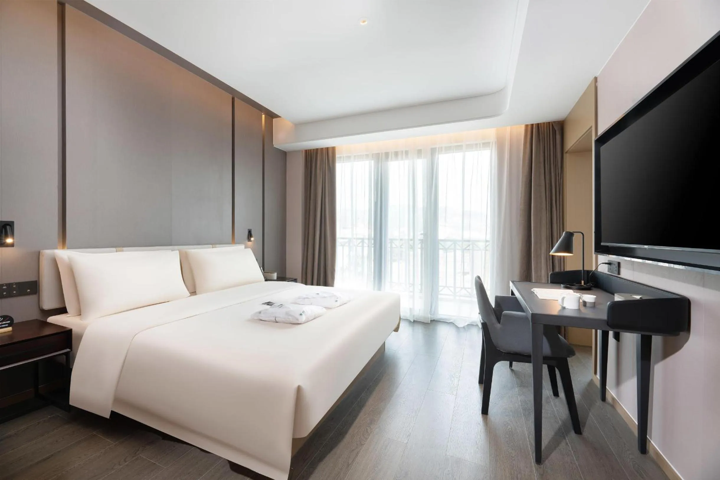 Bed in Atour Hotel Xishuangbanna Jinghong Gaozhuang Starlight Night Market