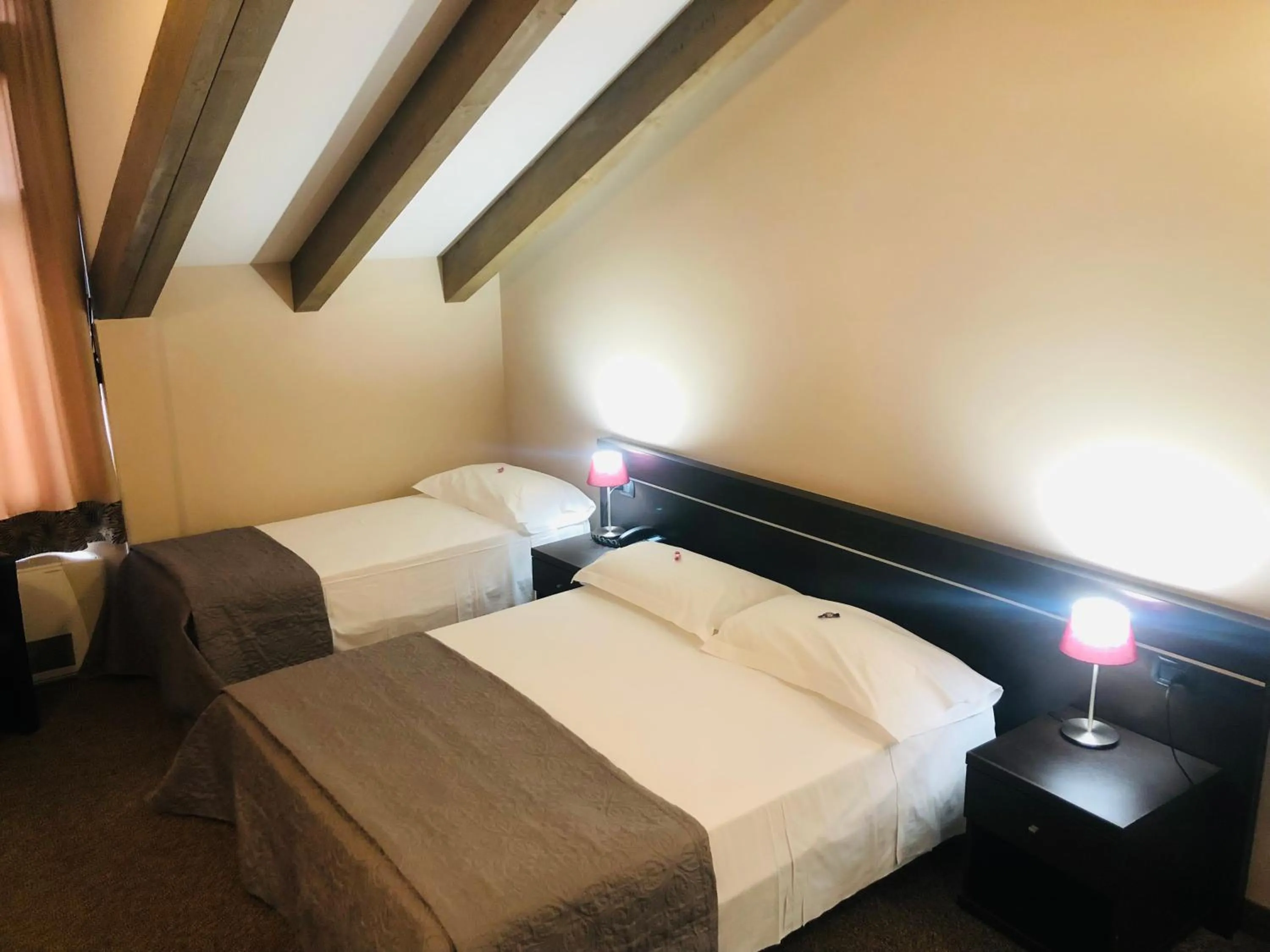 Bed in Hotel Malpensa INN Aereoporto