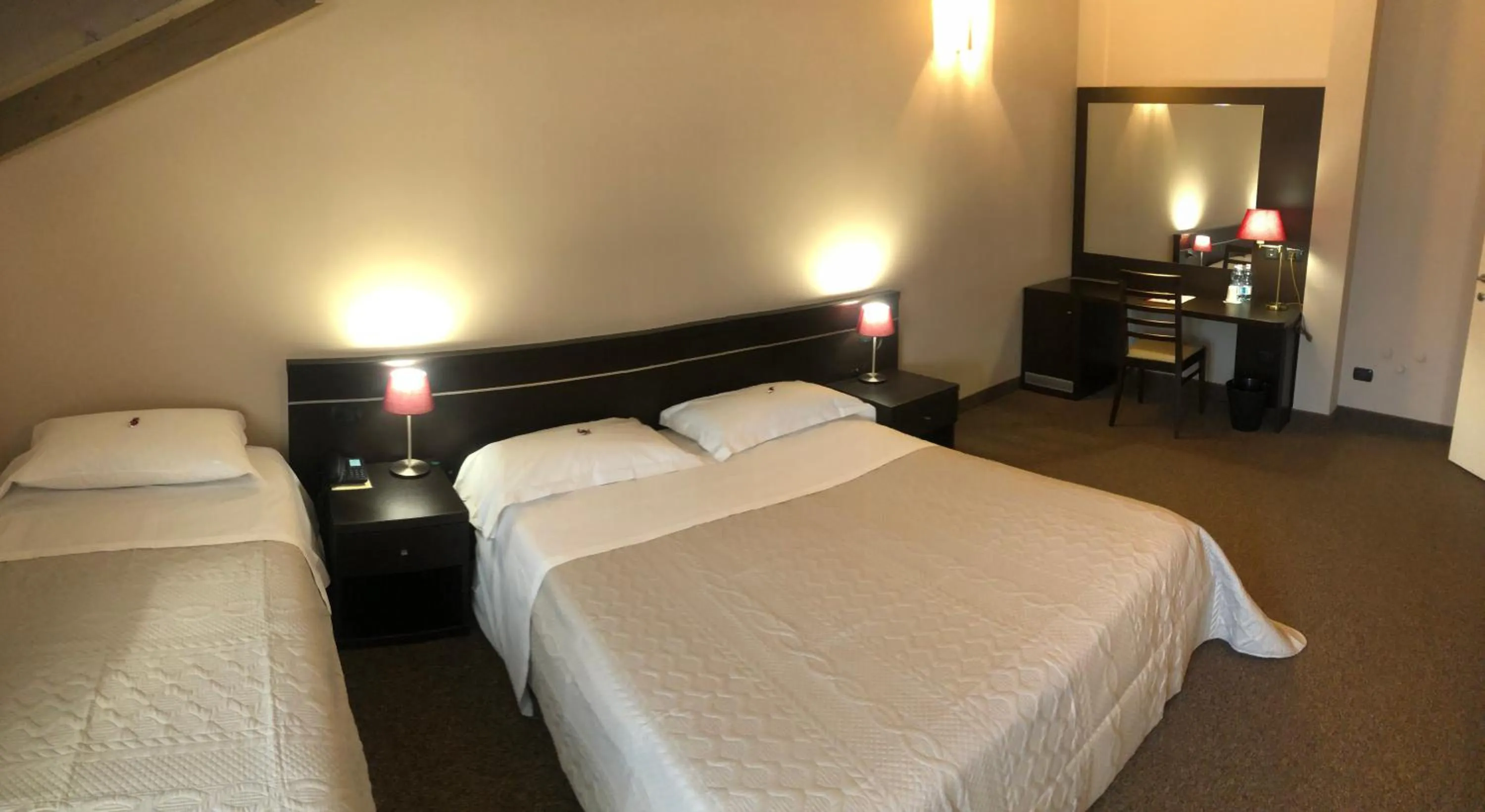 Photo of the whole room, Bed in Hotel Malpensa INN Aereoporto