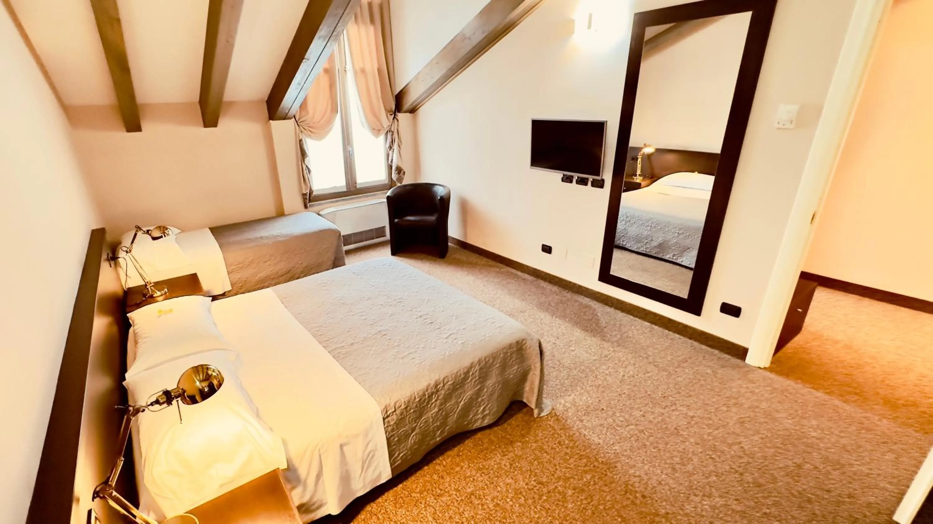 Photo of the whole room, Bed in Hotel Malpensa INN Aereoporto