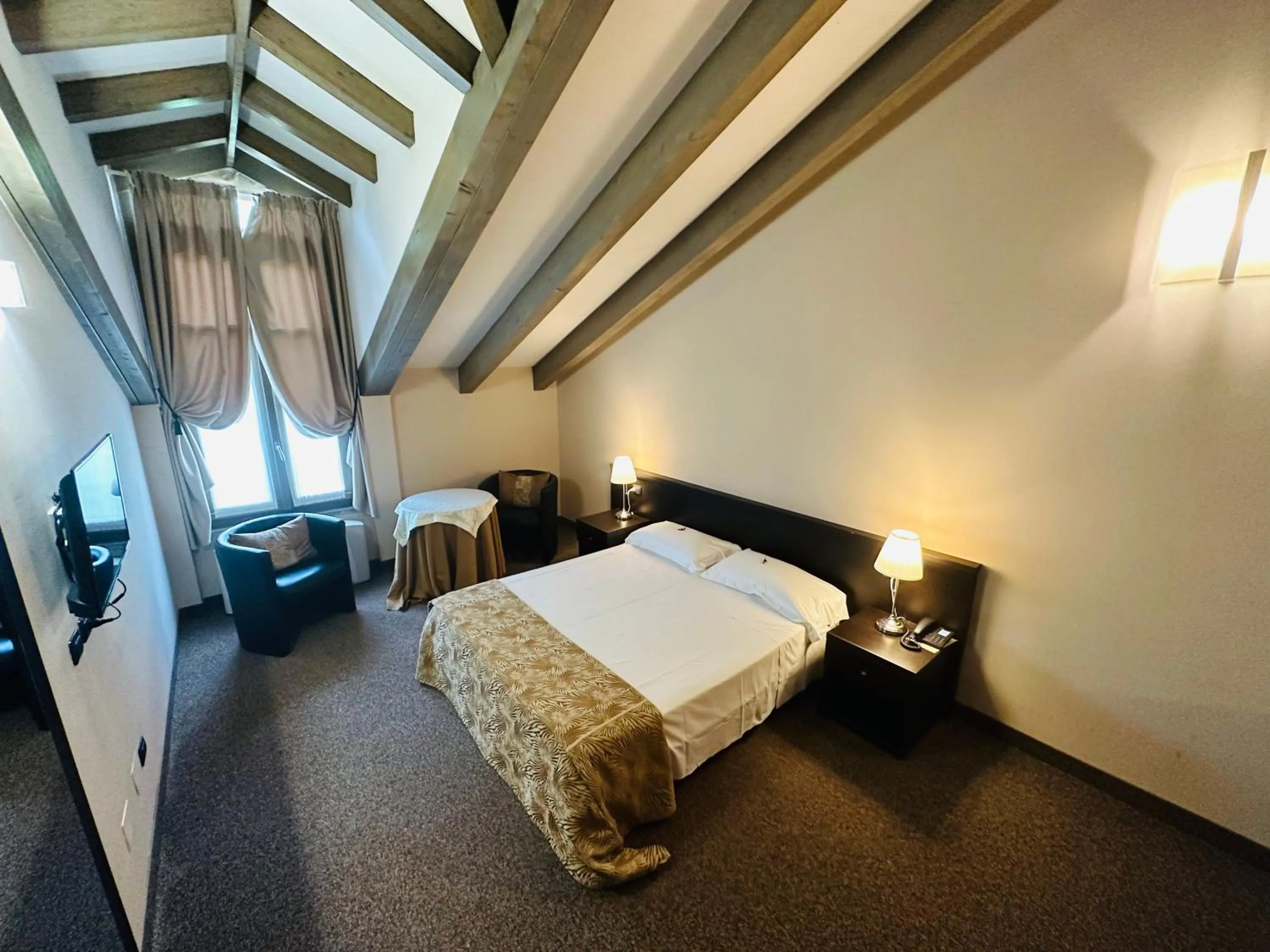 Bed in Hotel Malpensa INN Aereoporto