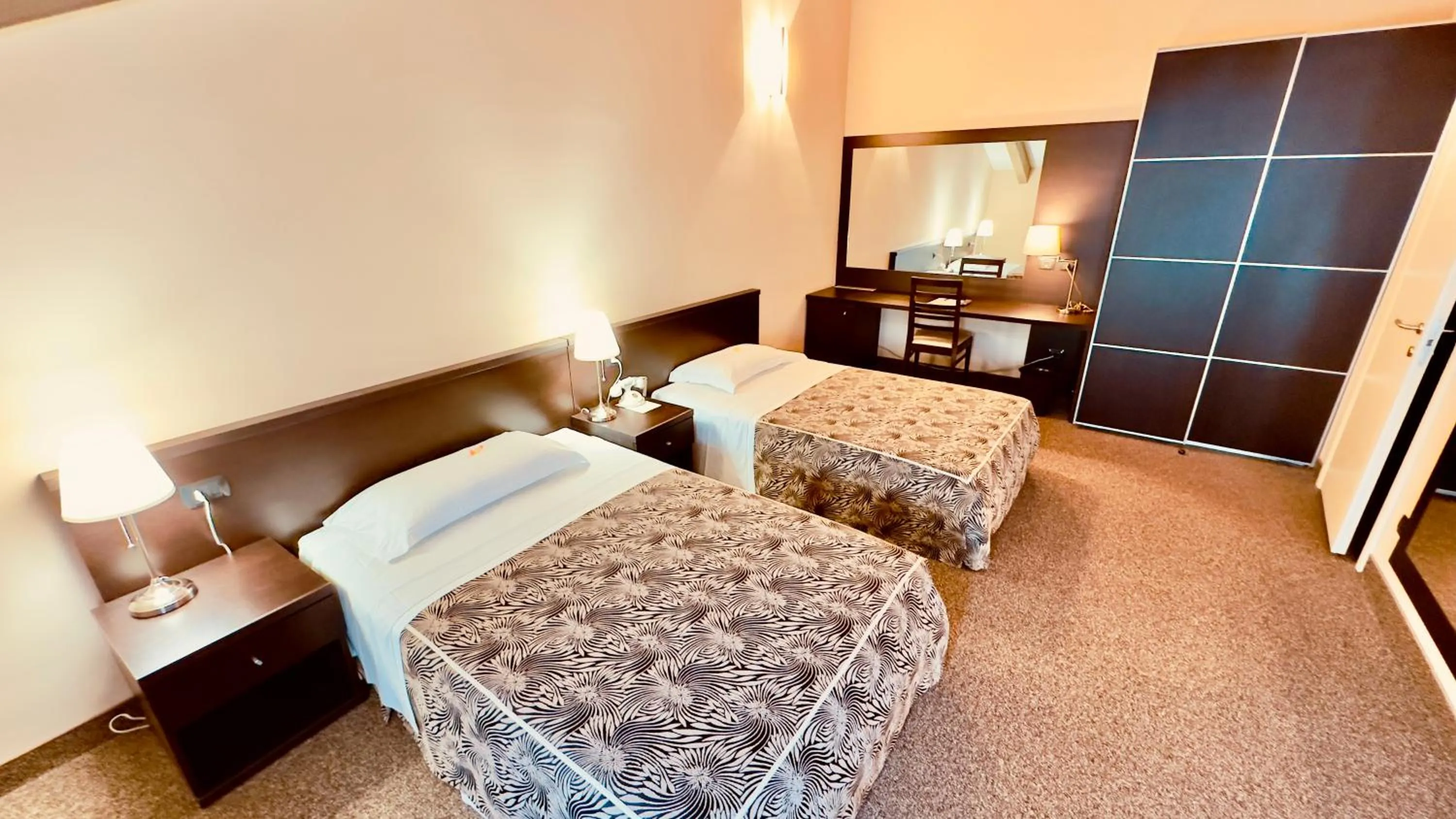 Photo of the whole room, Bed in Hotel Malpensa INN Aereoporto