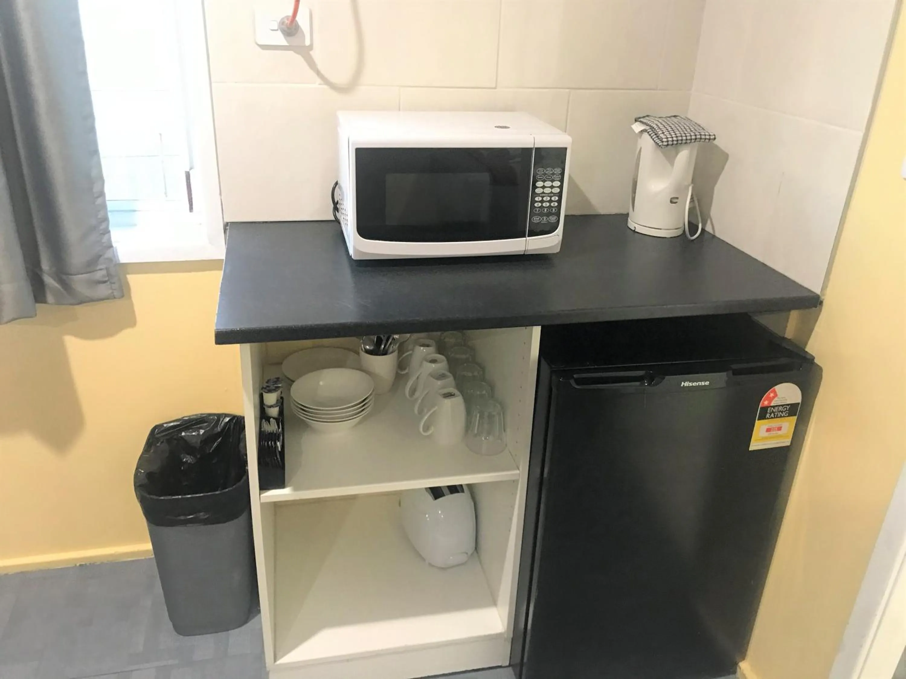 Kitchen or kitchenette in Toukley Motor Inn