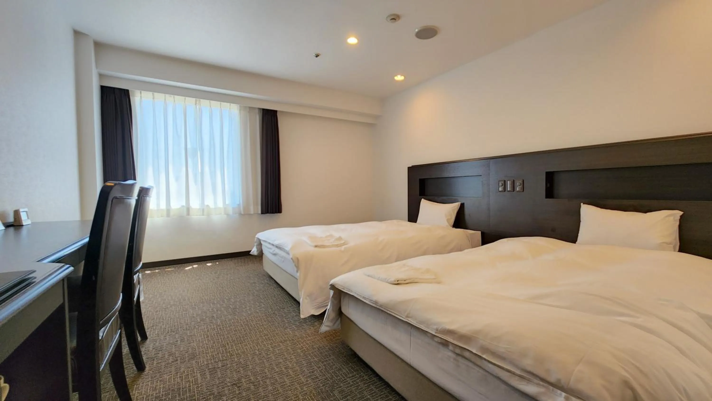 Bed in Platon Hotel Yokkaichi