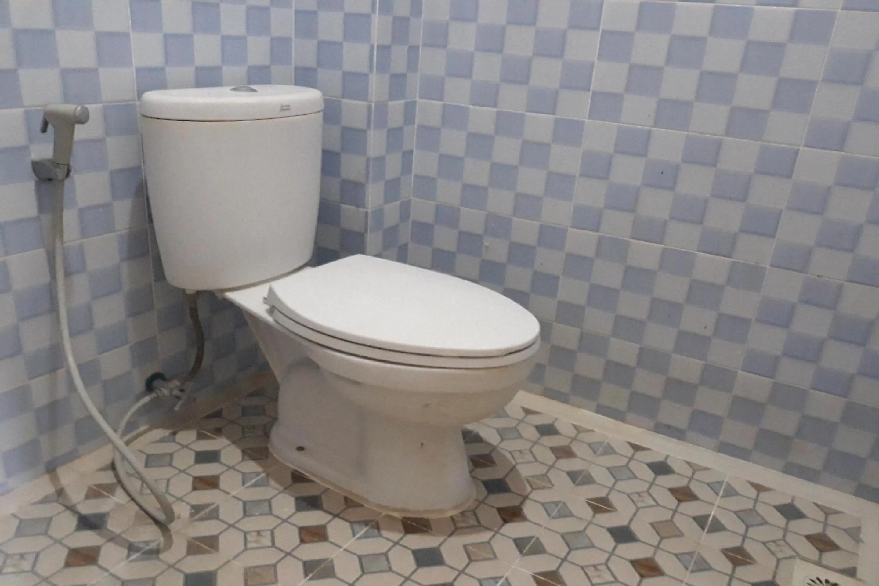 Bathroom in OYO 91162 Homestay Ansyariah Syariah