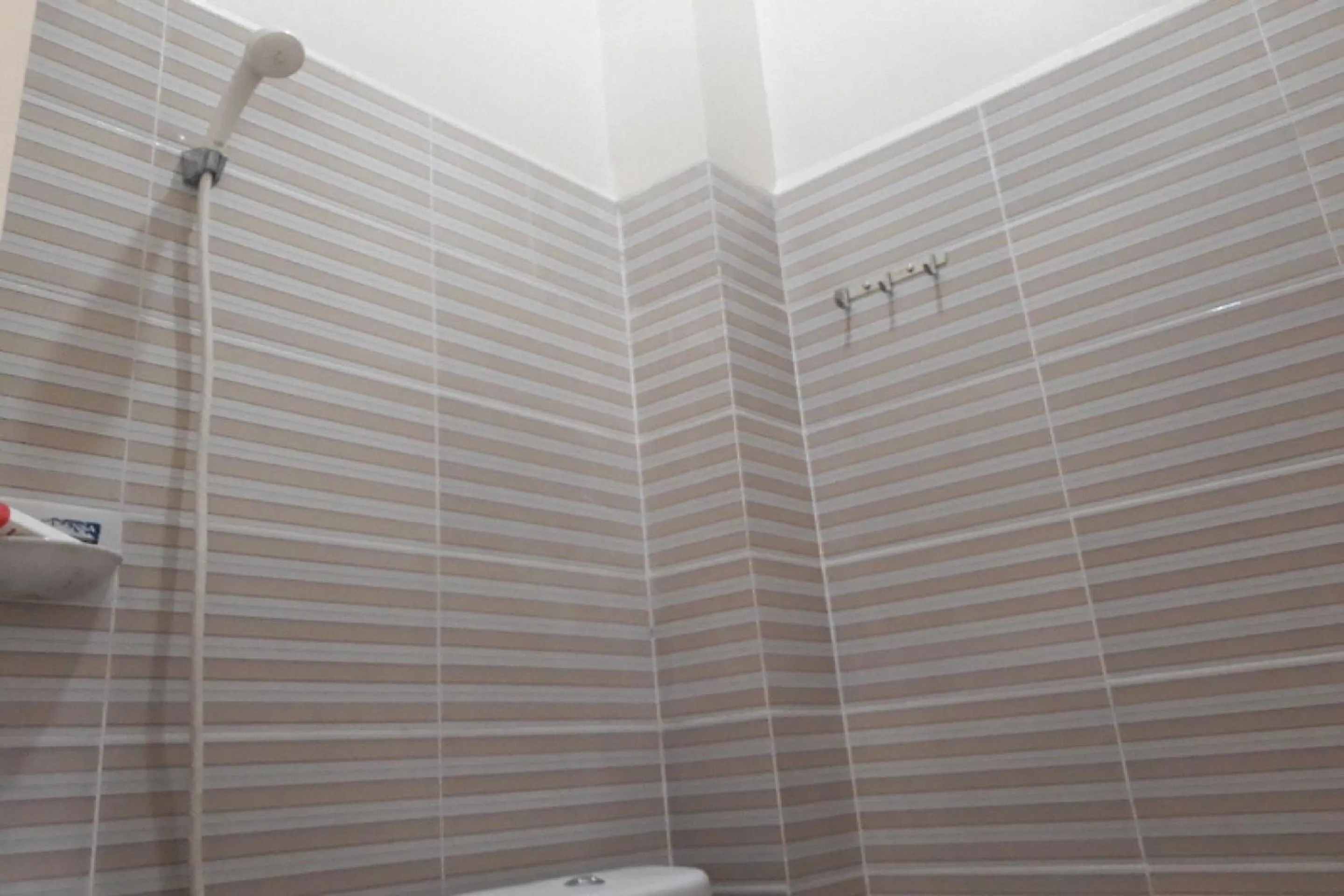 Bathroom in OYO 91162 Homestay Ansyariah Syariah
