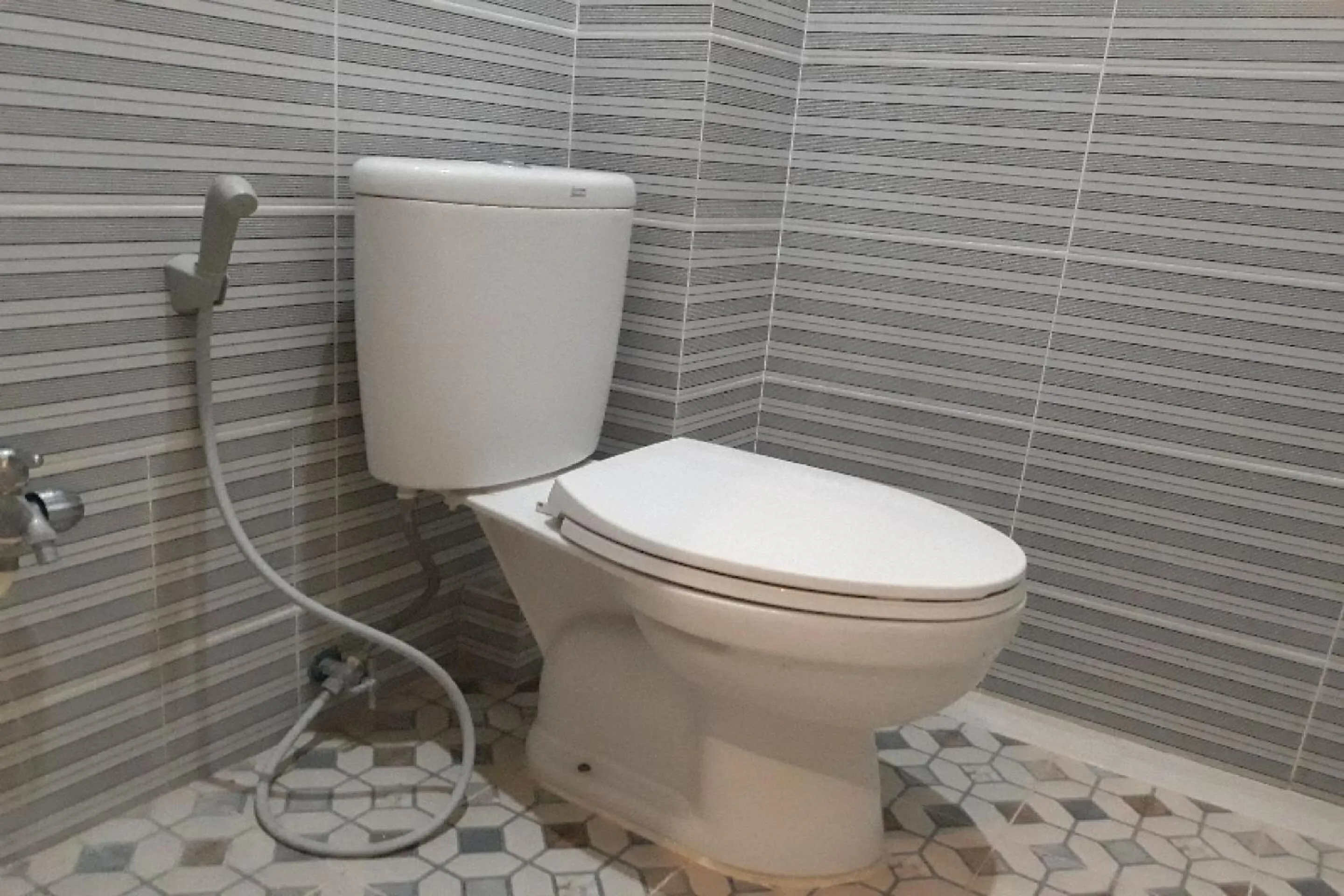 Bathroom in OYO 91162 Homestay Ansyariah Syariah