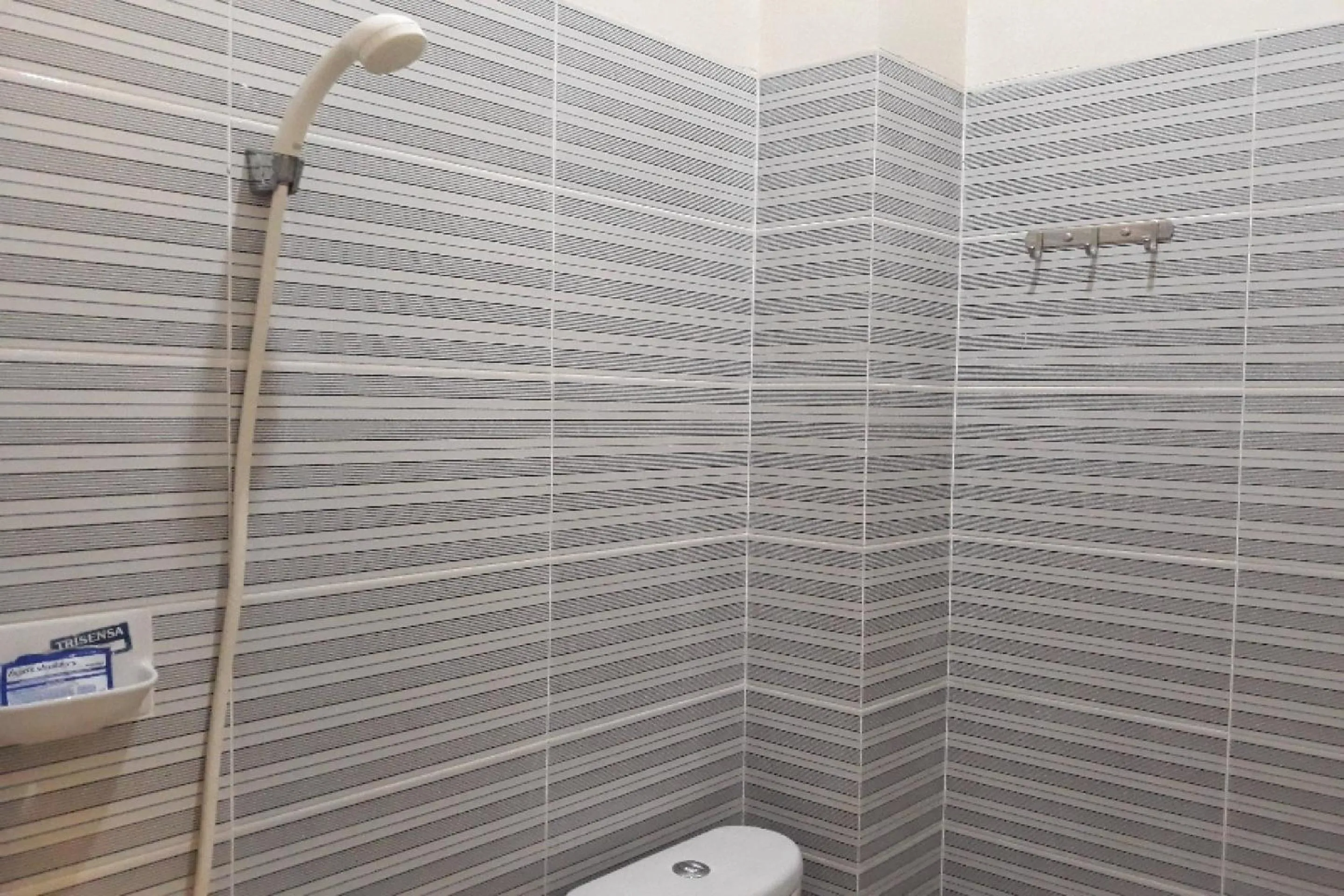 Bathroom in OYO 91162 Homestay Ansyariah Syariah