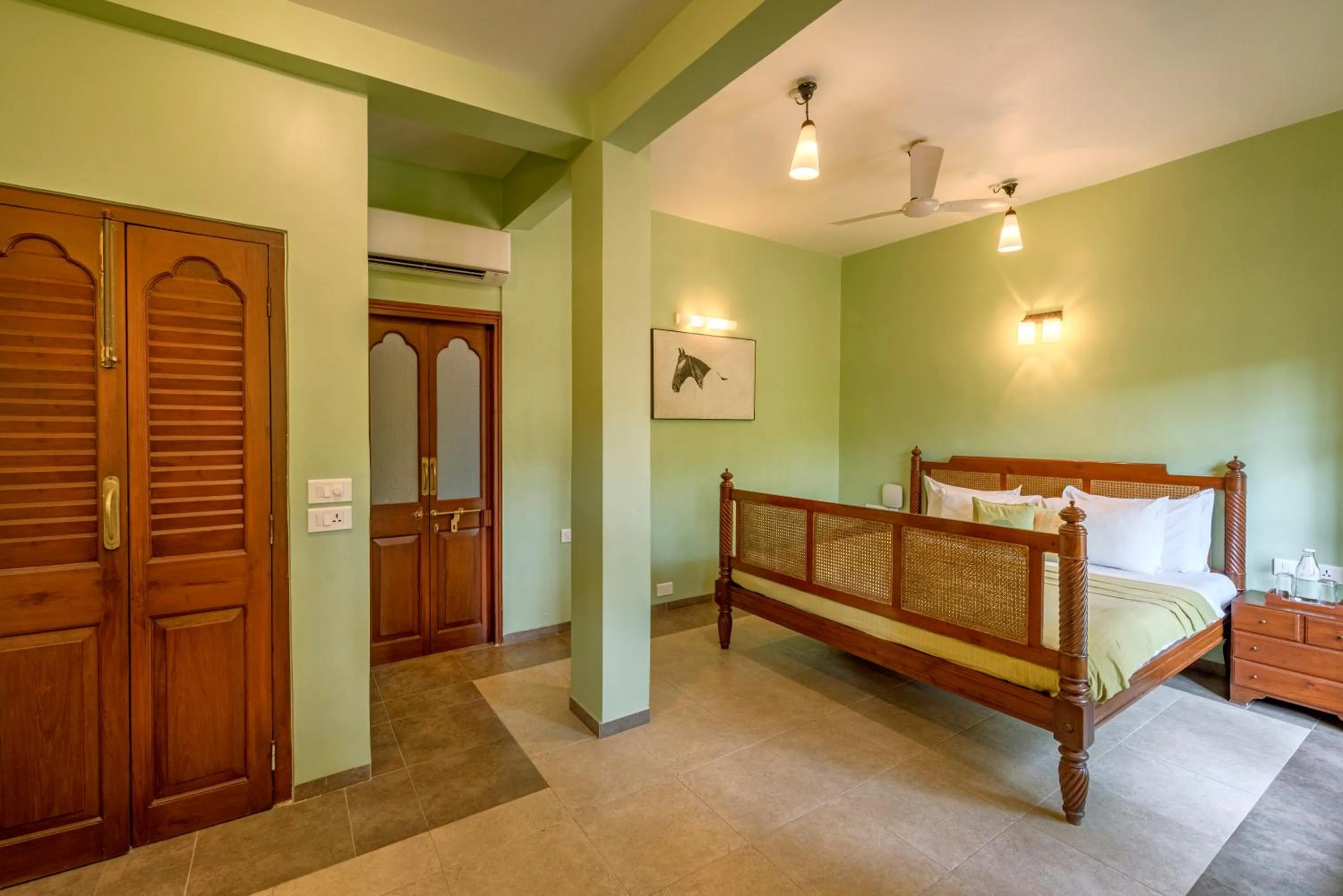 Bed in SaffronStays Casa Del Palms - 8BR luxury pool villa with gazebo, pickleball, bar & lawns near Nagaon Beach