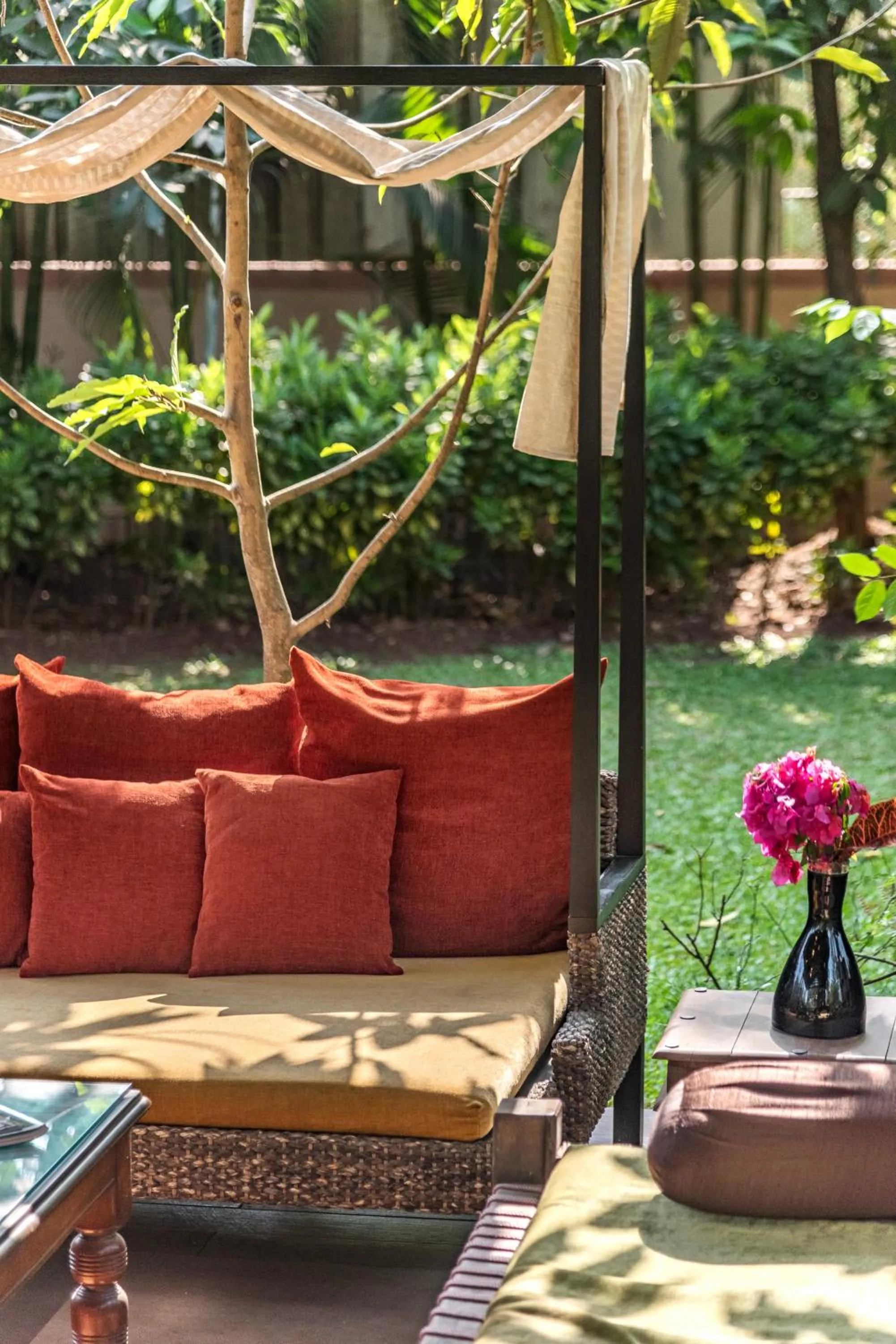 Day in SaffronStays Casa Del Palms - 8BR luxury pool villa with gazebo, pickleball, bar & lawns near Nagaon Beach