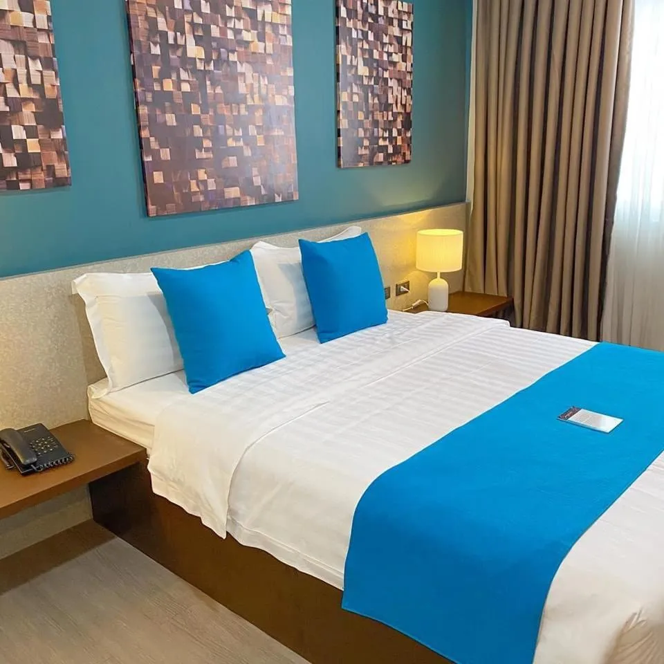 Bed in Fynn Boutique Hotel