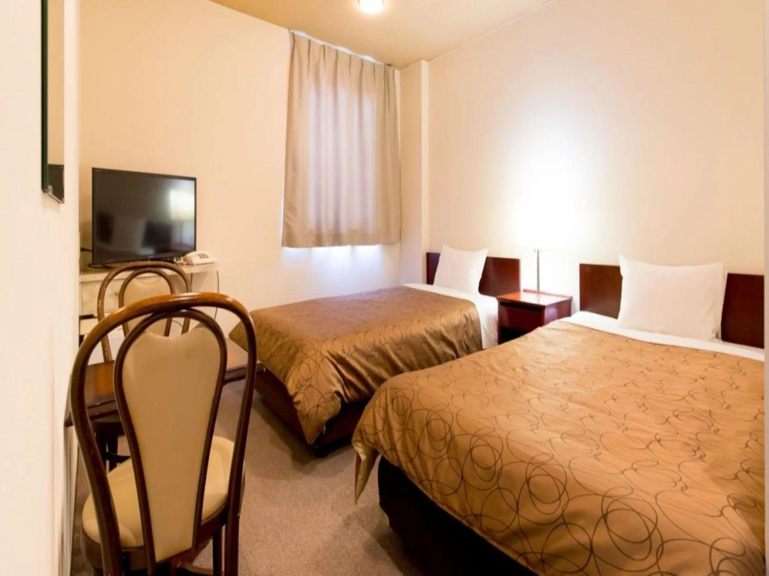 Bed in Business Hotel Kawashima