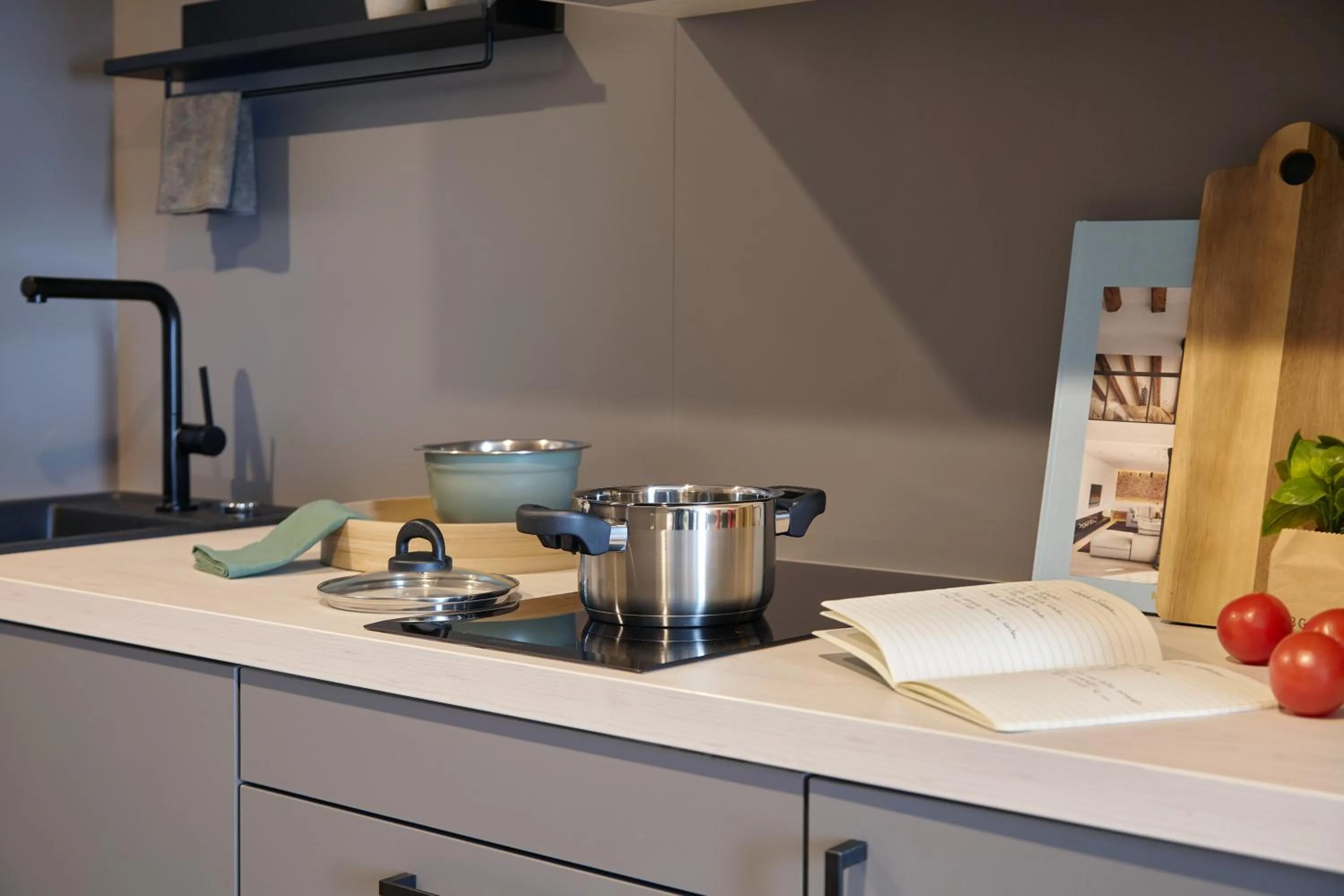 Kitchen or kitchenette in acora Dusseldorf Airport