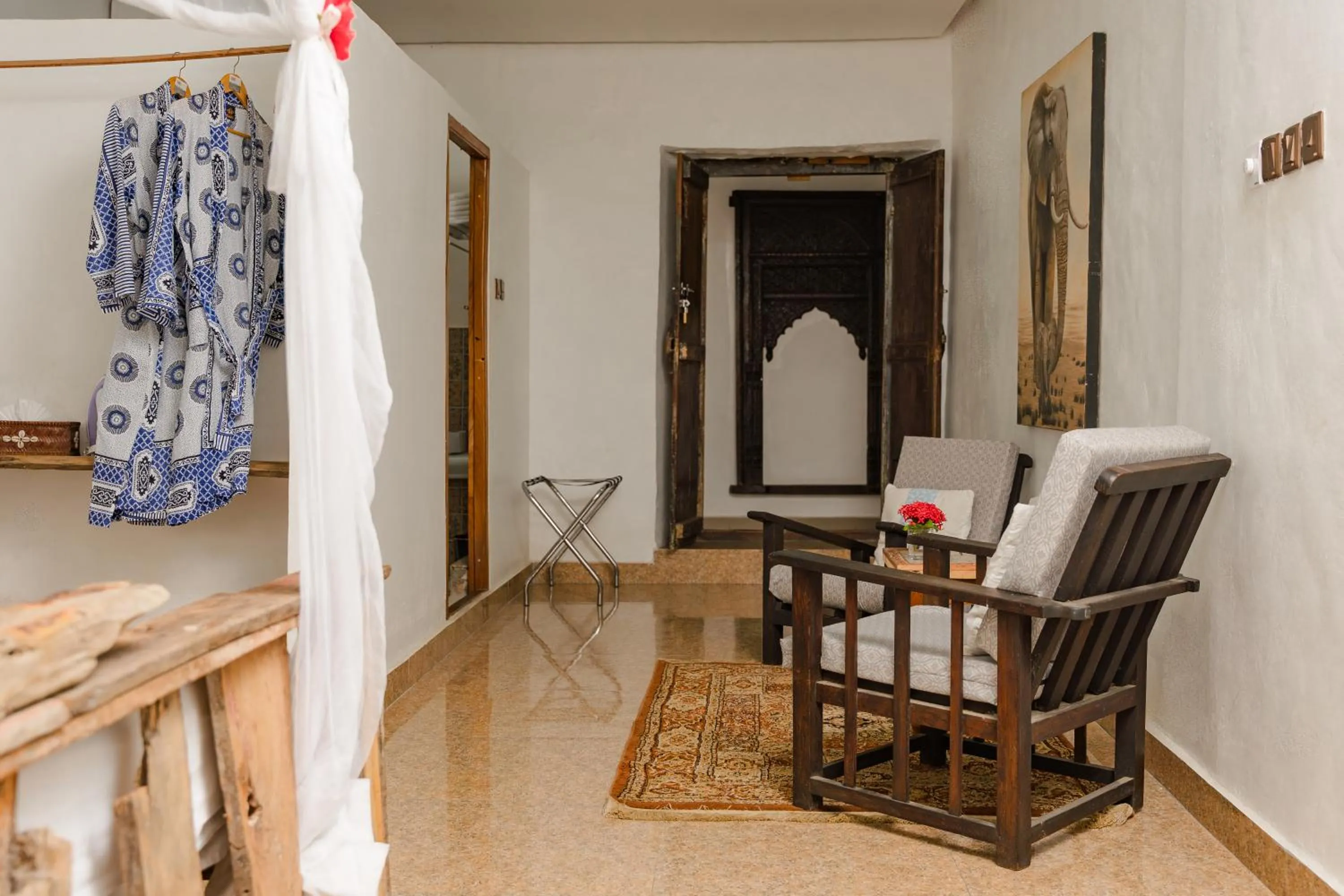 Bed in Emerald Palm Courtyard Hotel