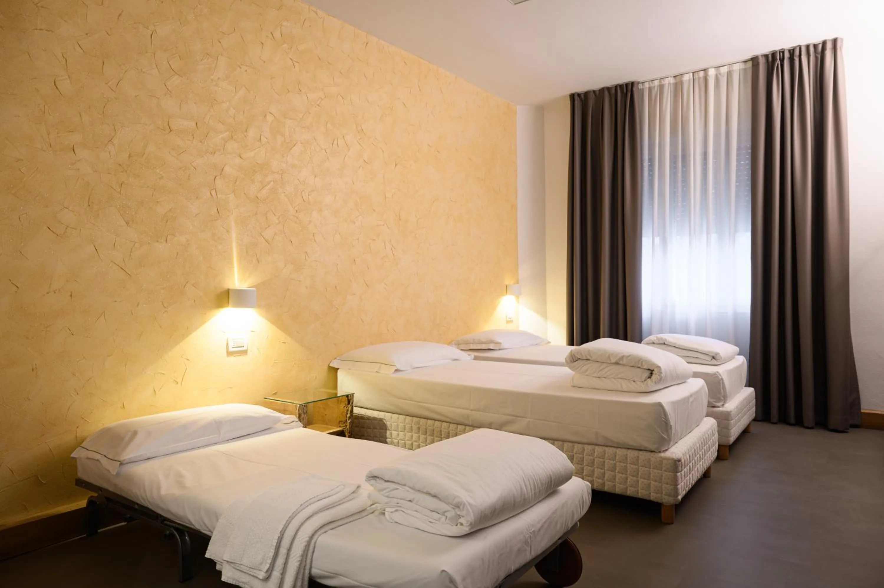 Bedroom in Hotel Due Ragni e Ristorante