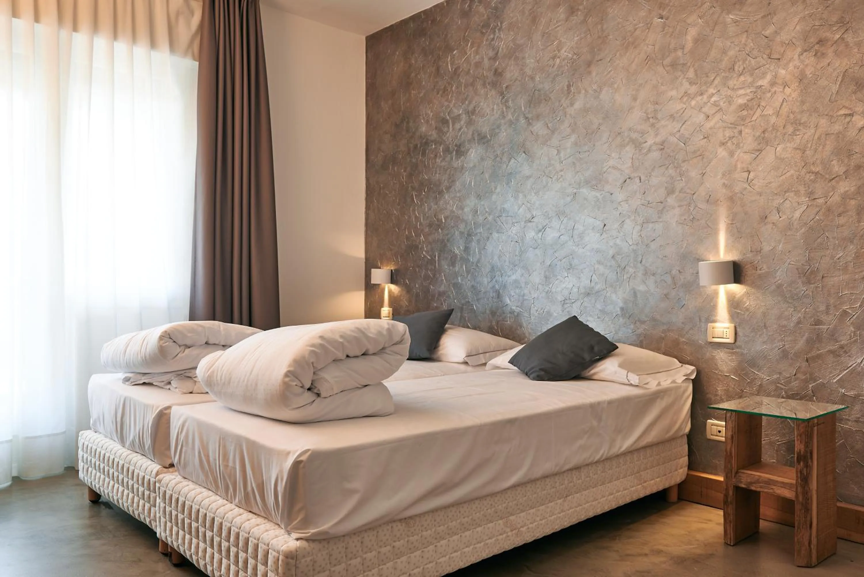 Bedroom in Hotel Due Ragni e Ristorante