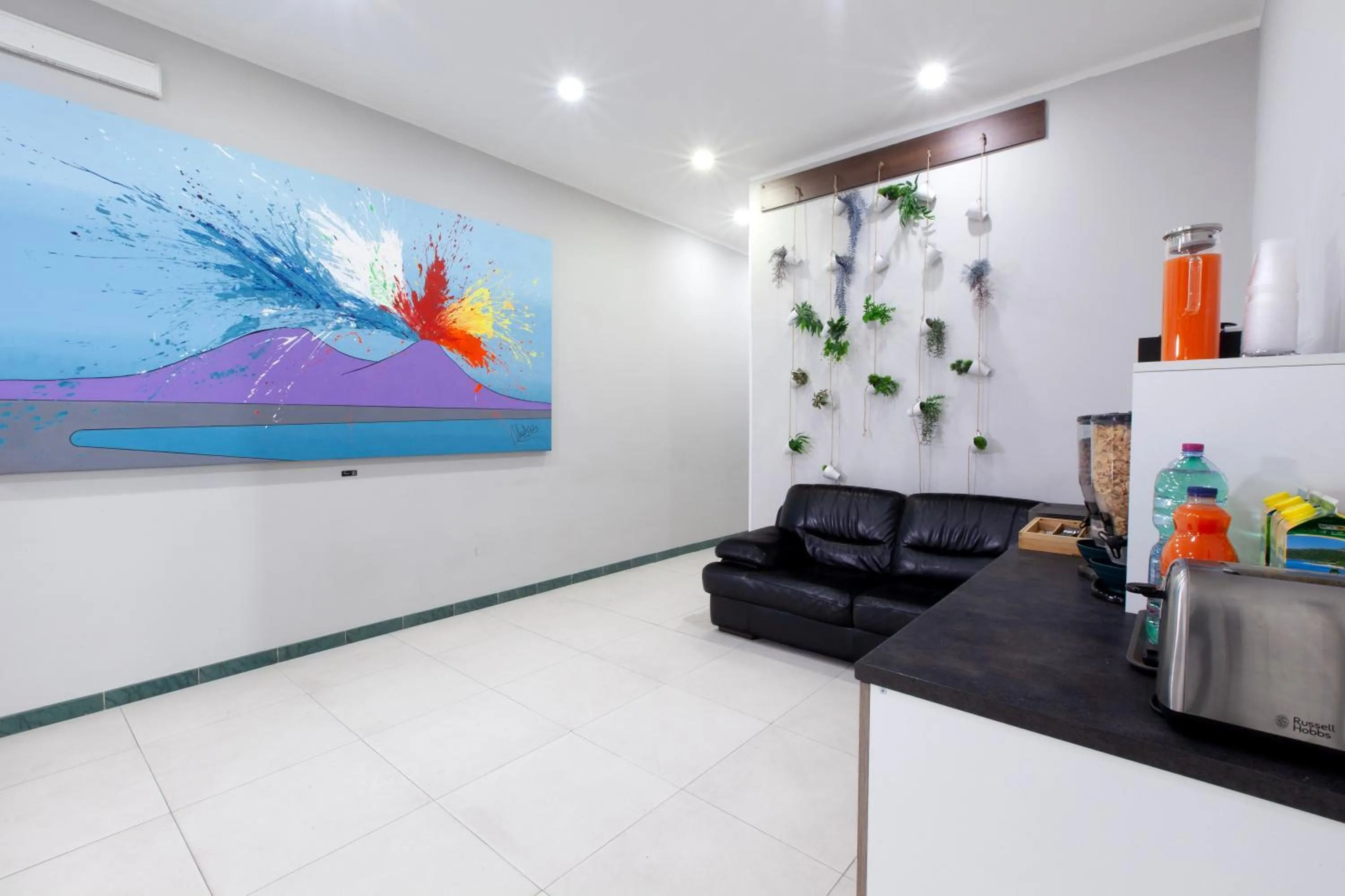 Living room in ROYAL ROOMS STATION NAPOLI