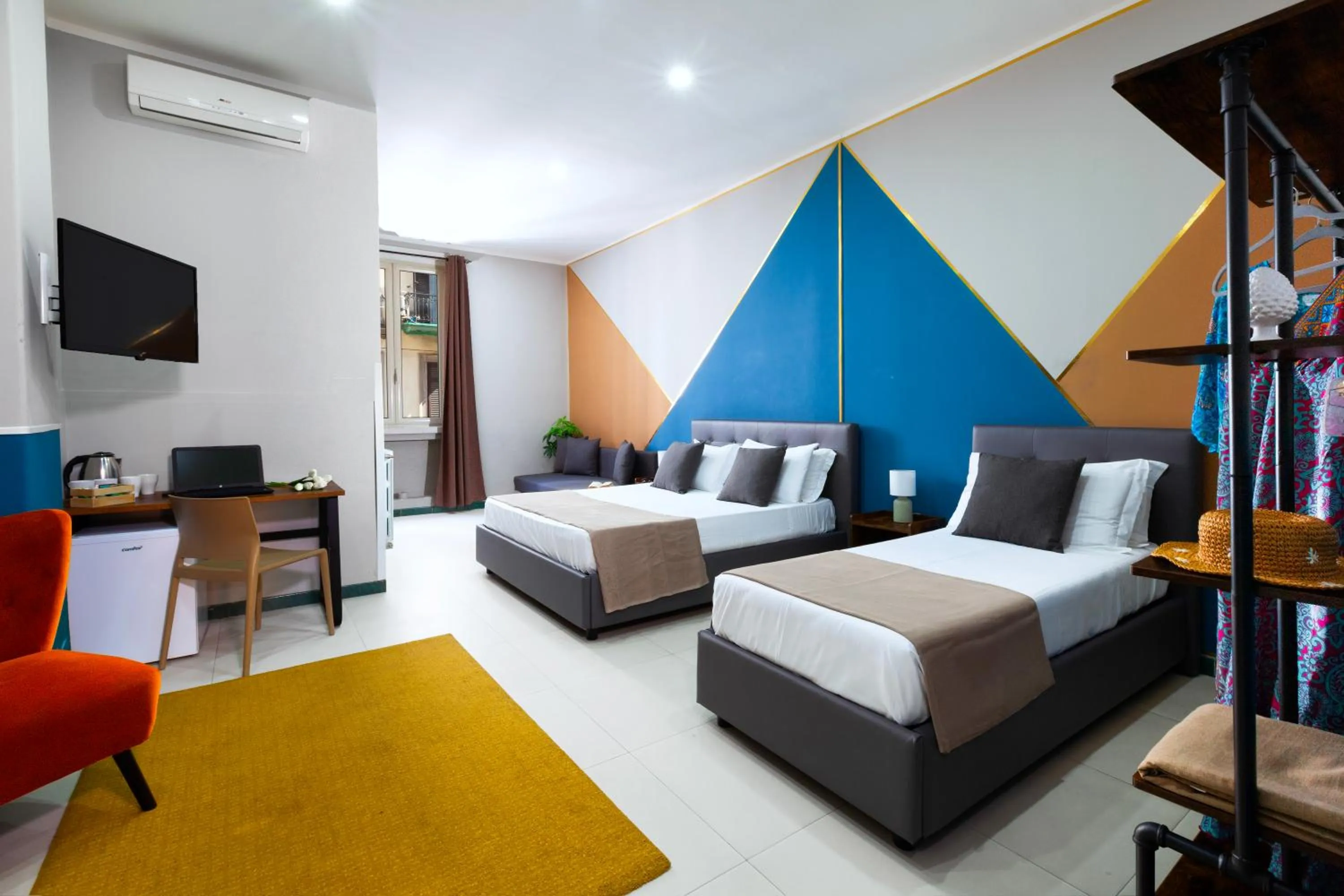 Bed in ROYAL ROOMS STATION NAPOLI