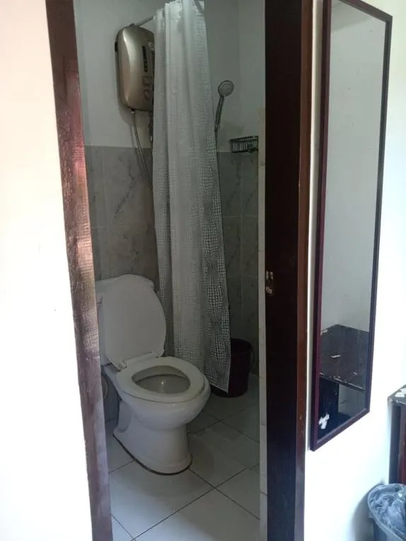 Bathroom in Chelle's Apartelle-Inn