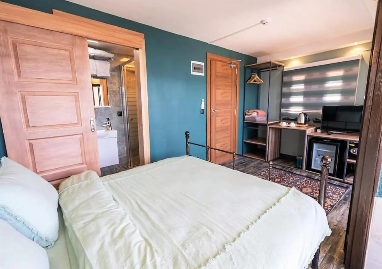 Bed in Liman Deluxe Hotel